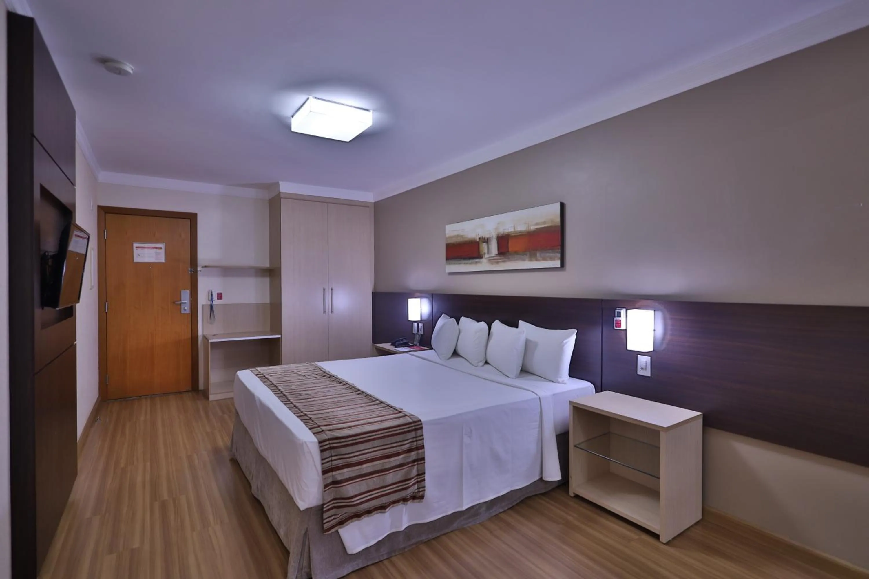 Bed in Ramada Hotel & Suites Lagoa Santa By Wyndham