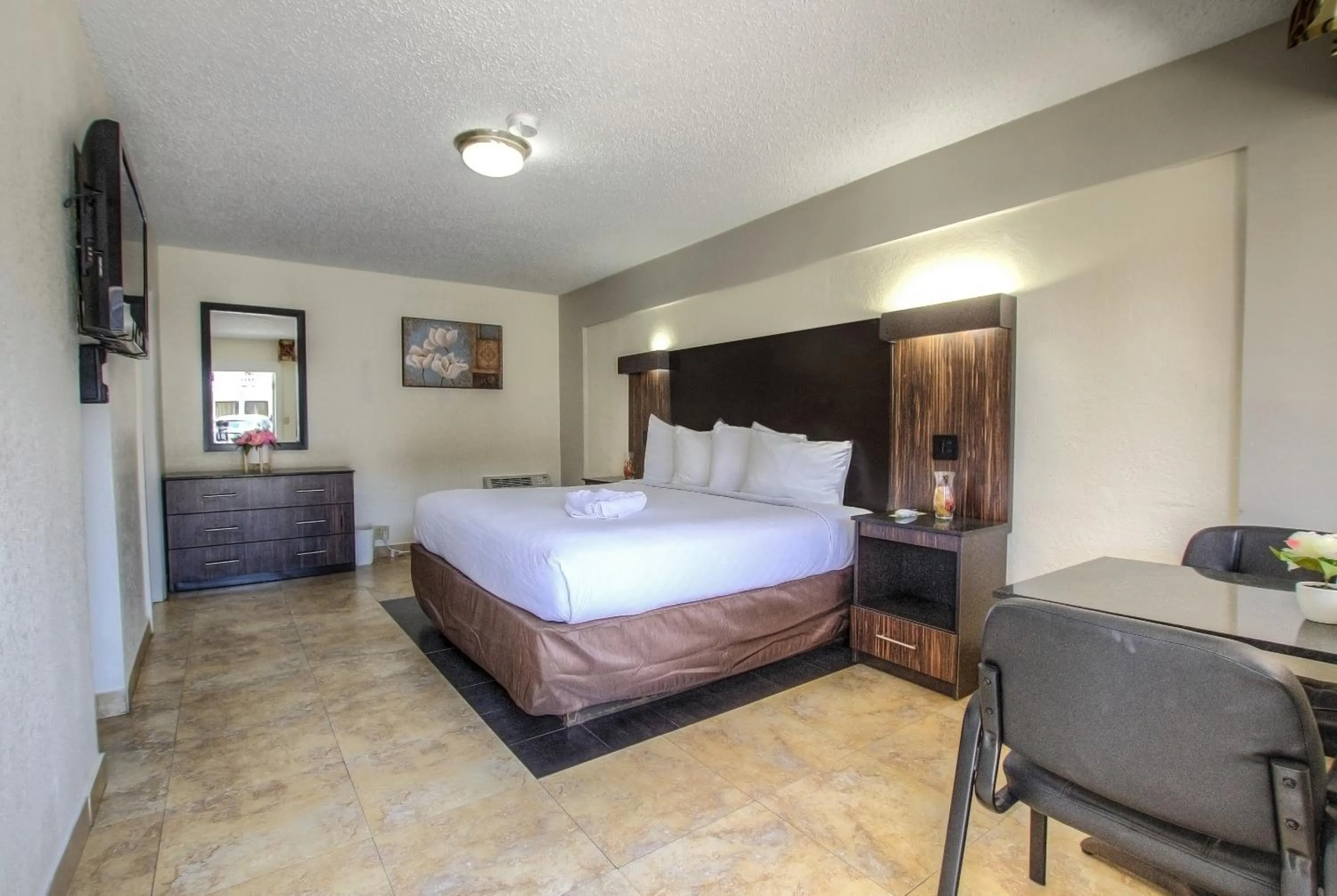 Bed in La Bella Oceanfront Inn - Daytona