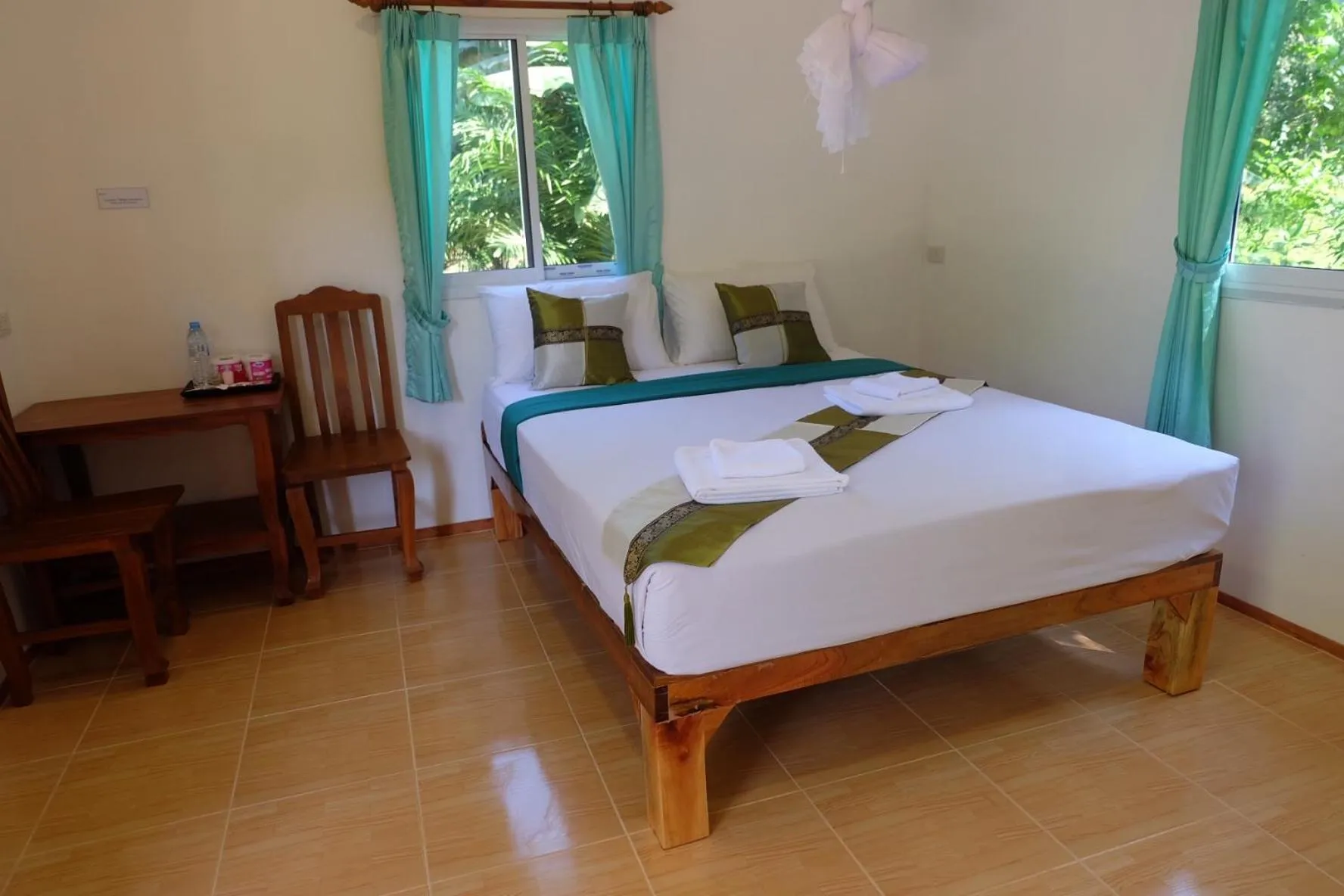 Photo of the whole room, Bed in Khaosok Bamboo Huts Resort