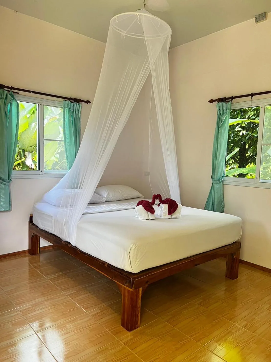 Bed in Khaosok Bamboo Huts Resort