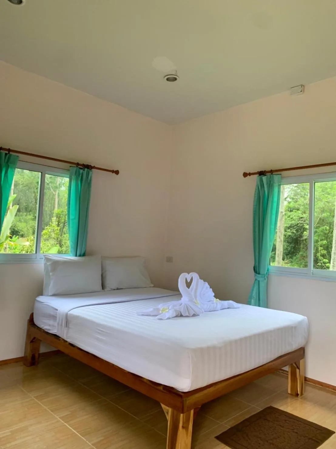 Bed in Khaosok Bamboo Huts Resort