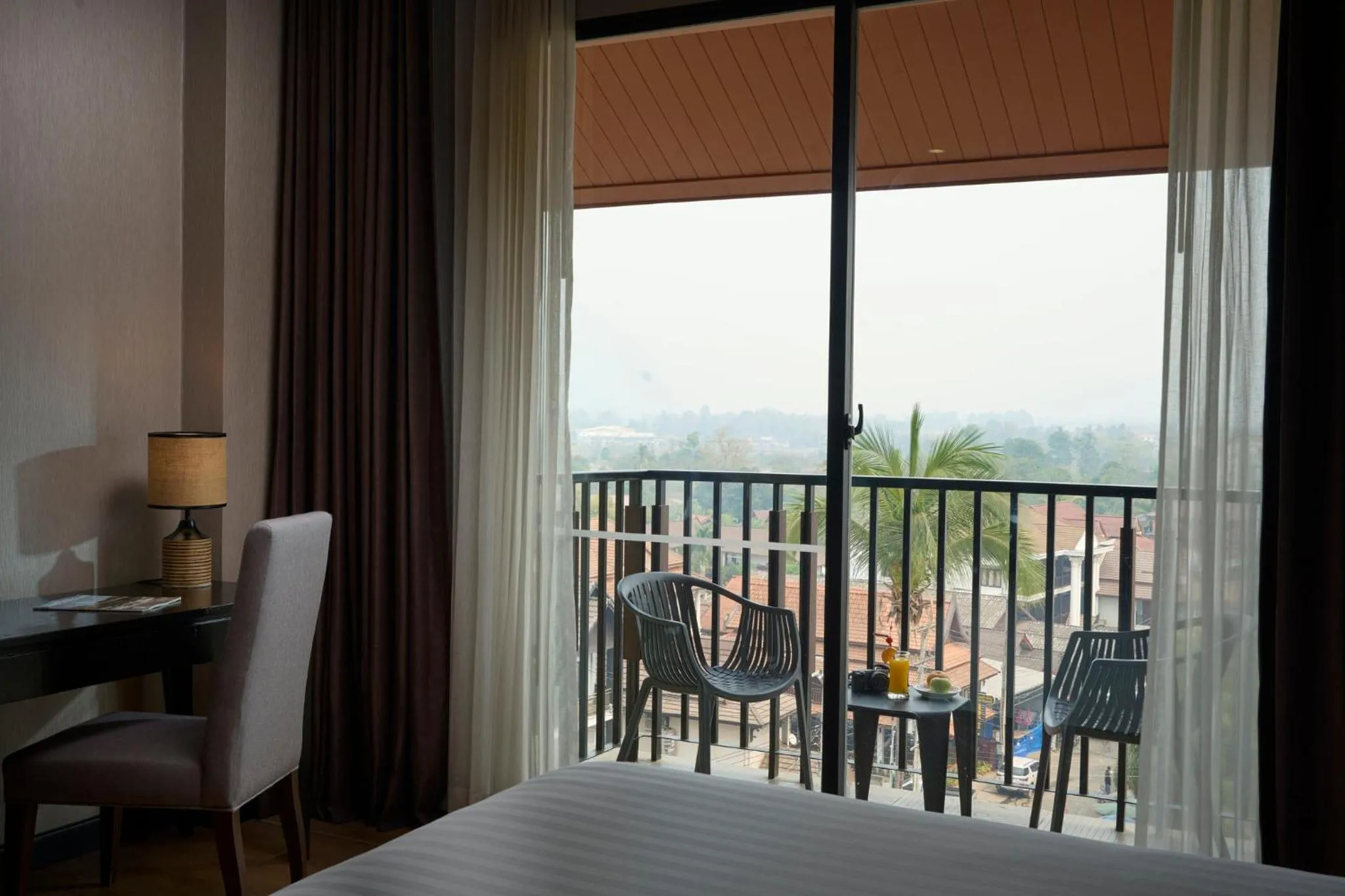 Photo of the whole room, Bed in Amari Vang Vieng