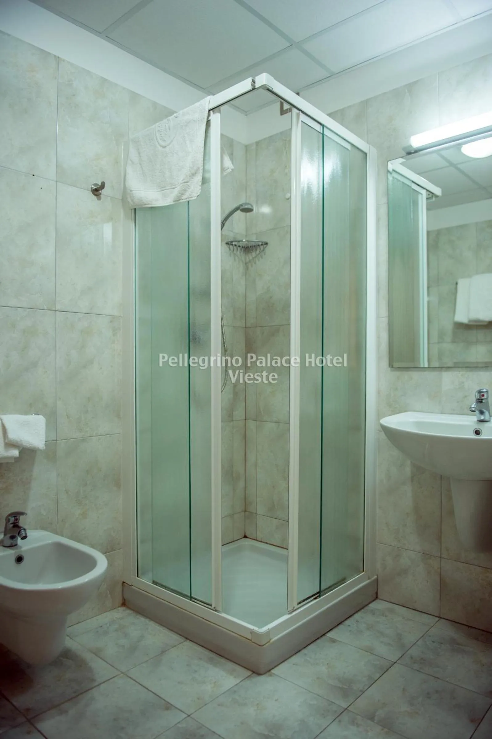 Bathroom in Pellegrino Palace Hotel