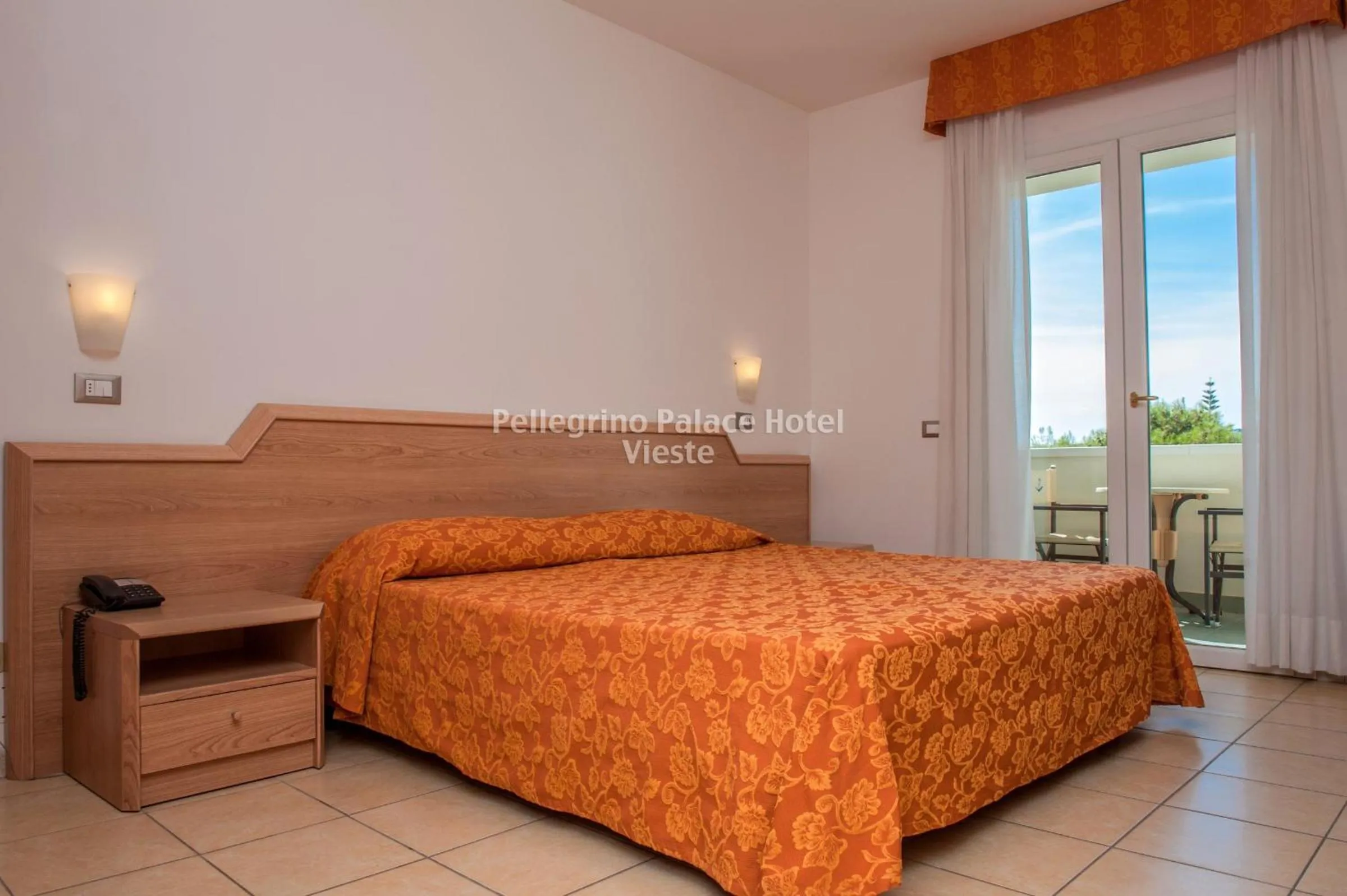 Bedroom in Pellegrino Palace Hotel