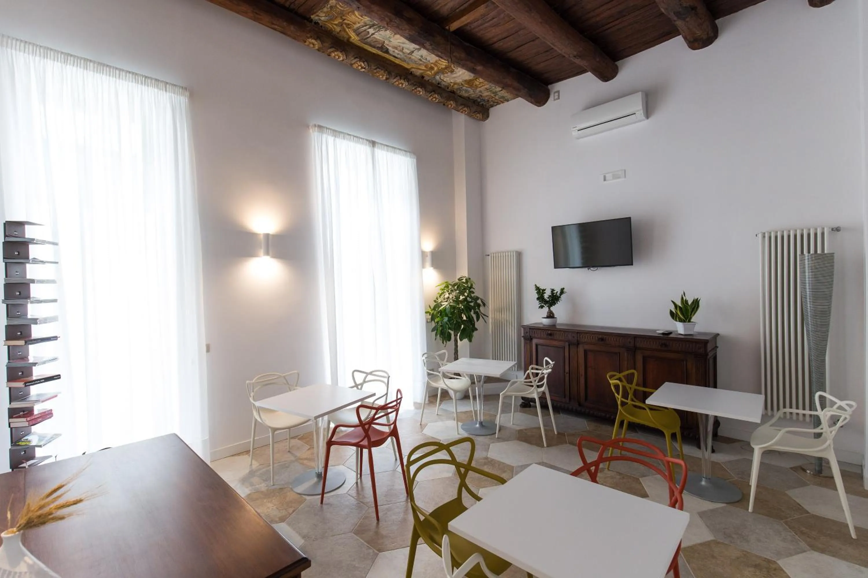 Communal lounge/ TV room in Savoy Riviera