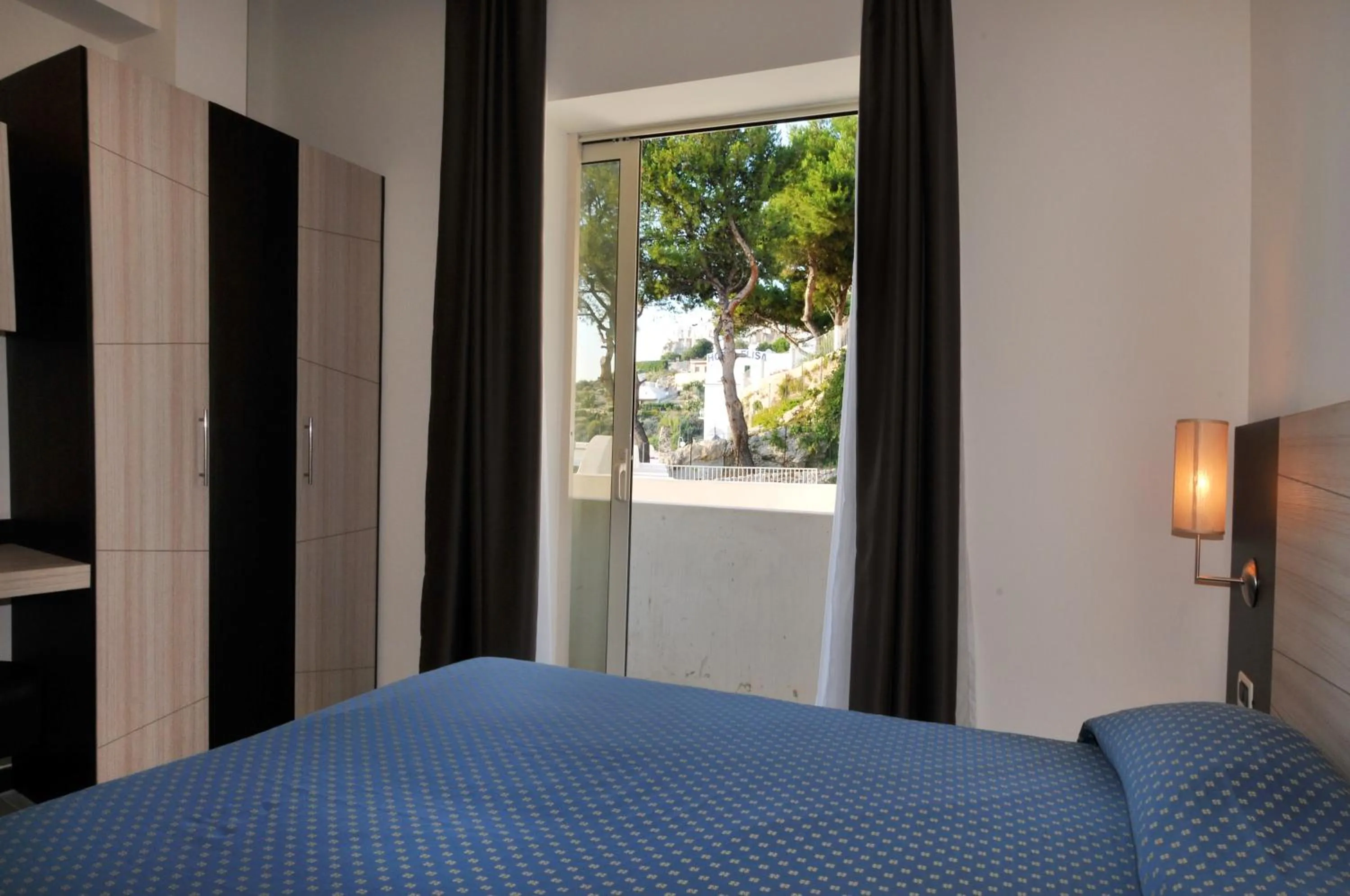 Bed in Morcavallo Hotel & Wellness