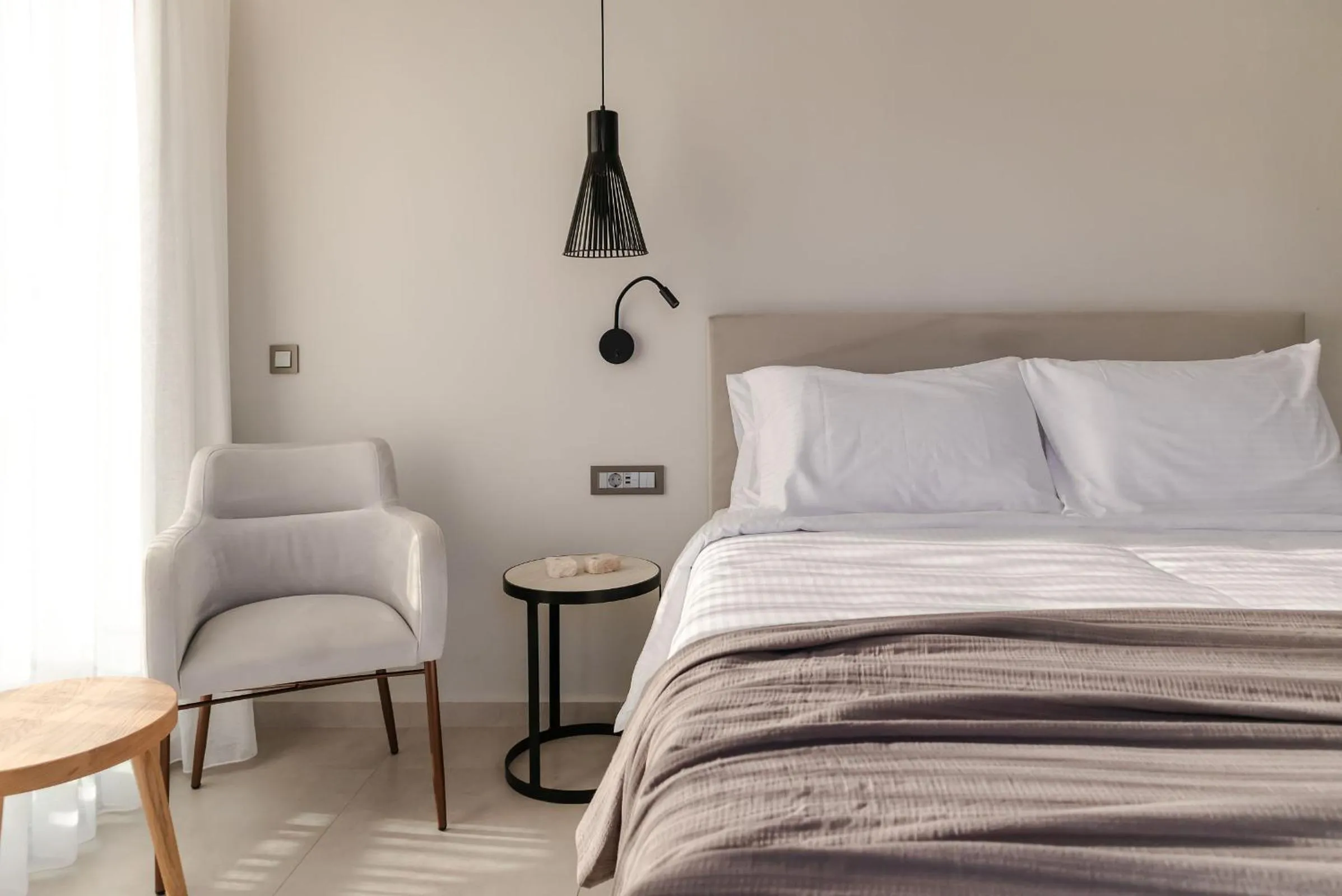 Bed in Batis Aero Beachfront Wellbeing Hotel