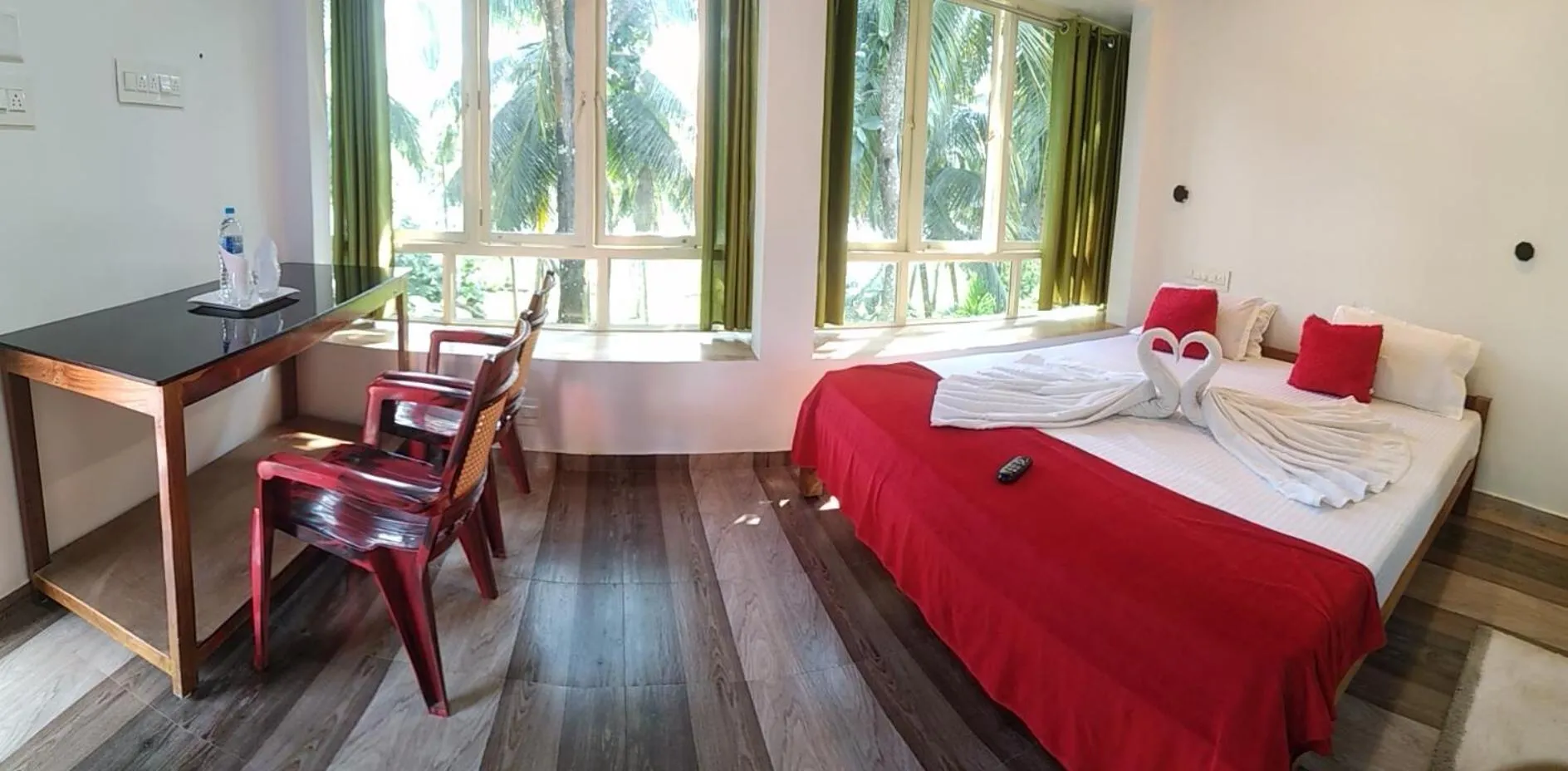 RoomNo.107 Deluxe AC Room with Balcony and Lake view in Blue Birds Homestay