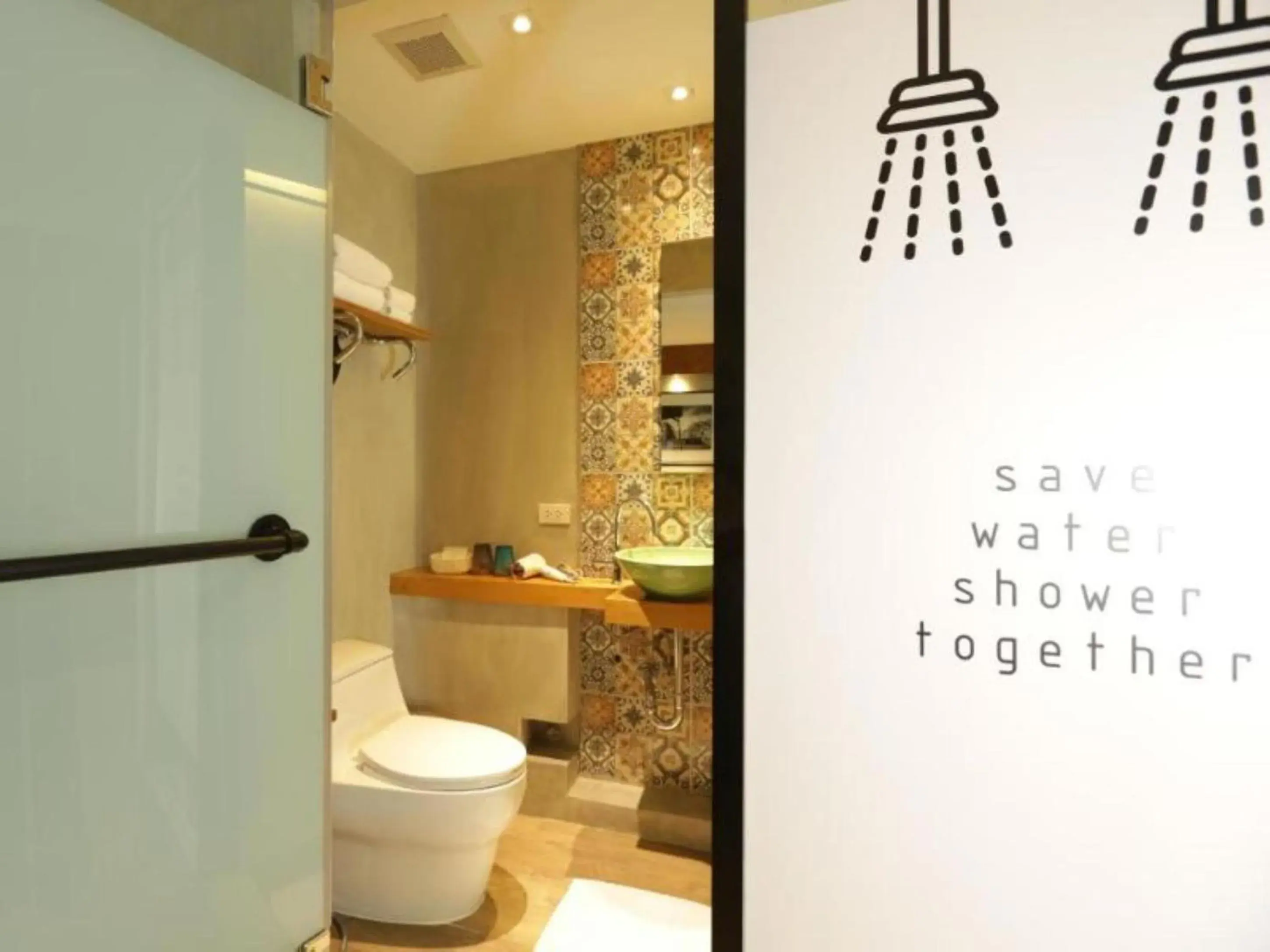 Bathroom in Nandha Hotel Bathroom in Nandha Hotel