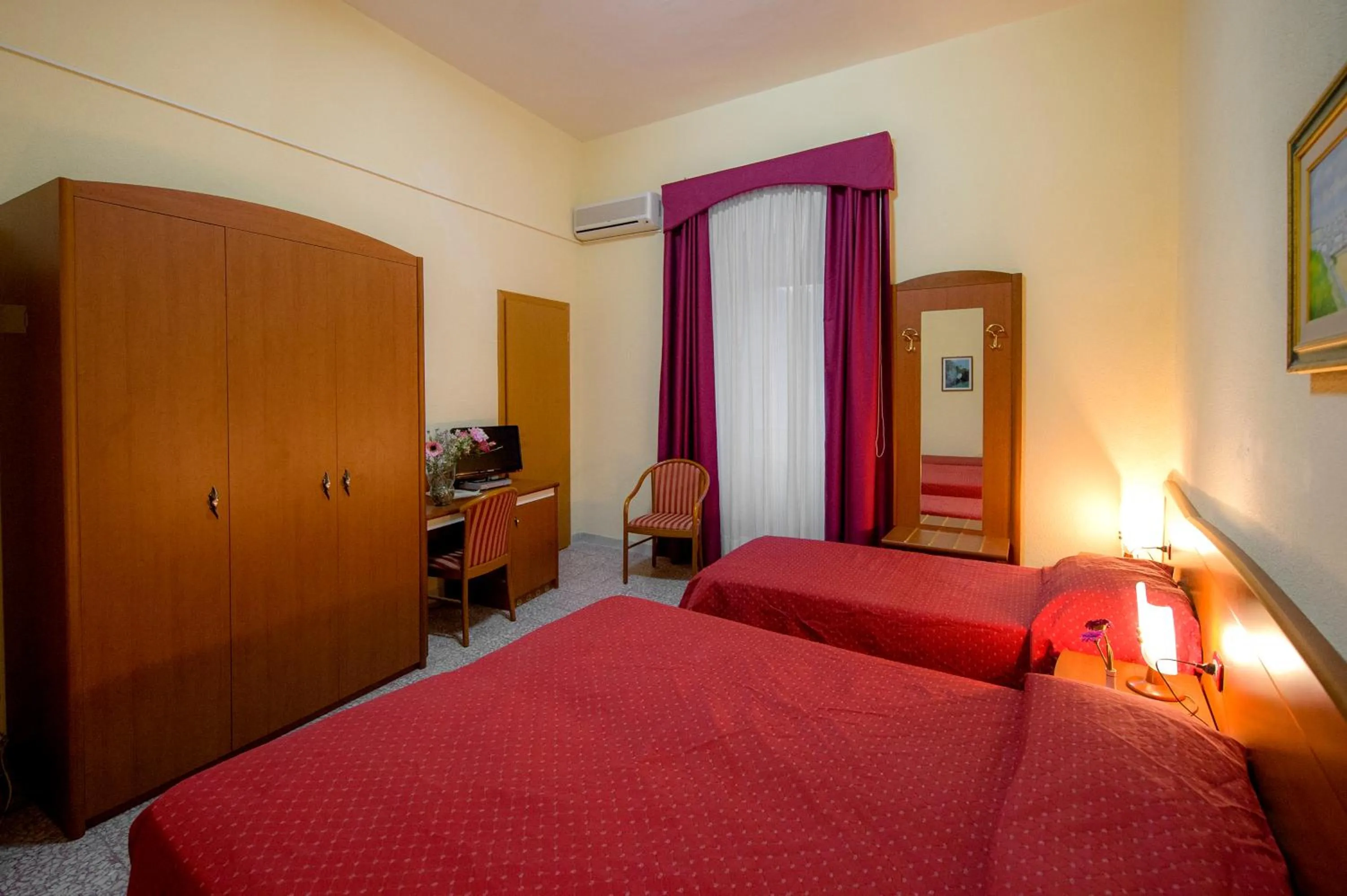 Bed in Hotel Miramare