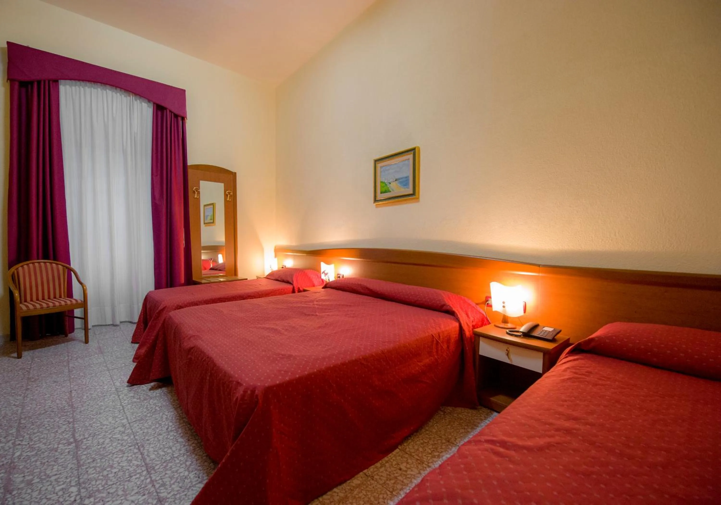 Bed in Hotel Miramare