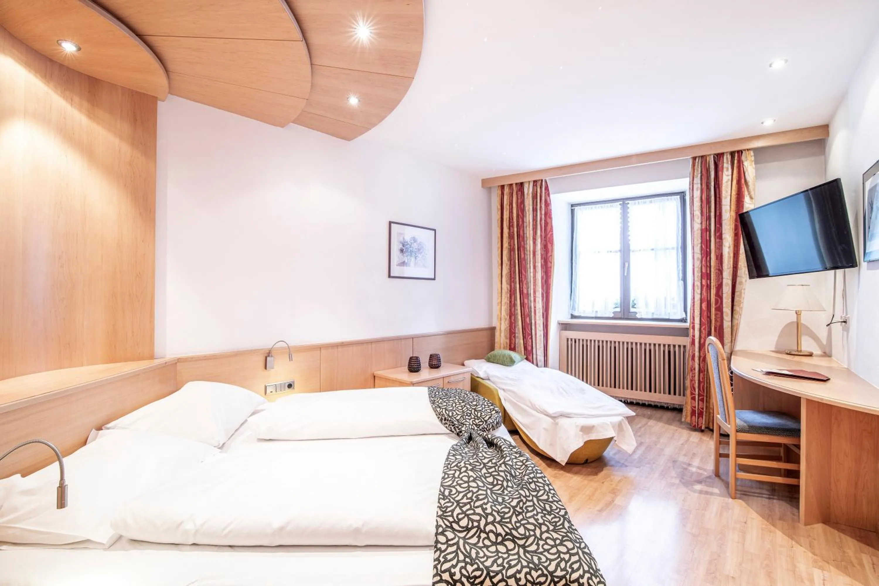 Bed in Posthotel Lamm