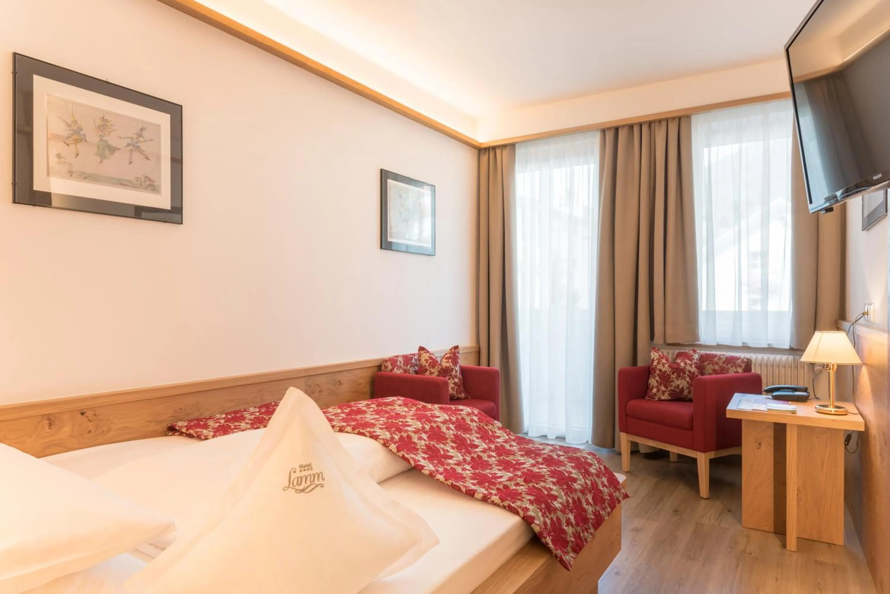 Photo of the whole room, Bed in Posthotel Lamm