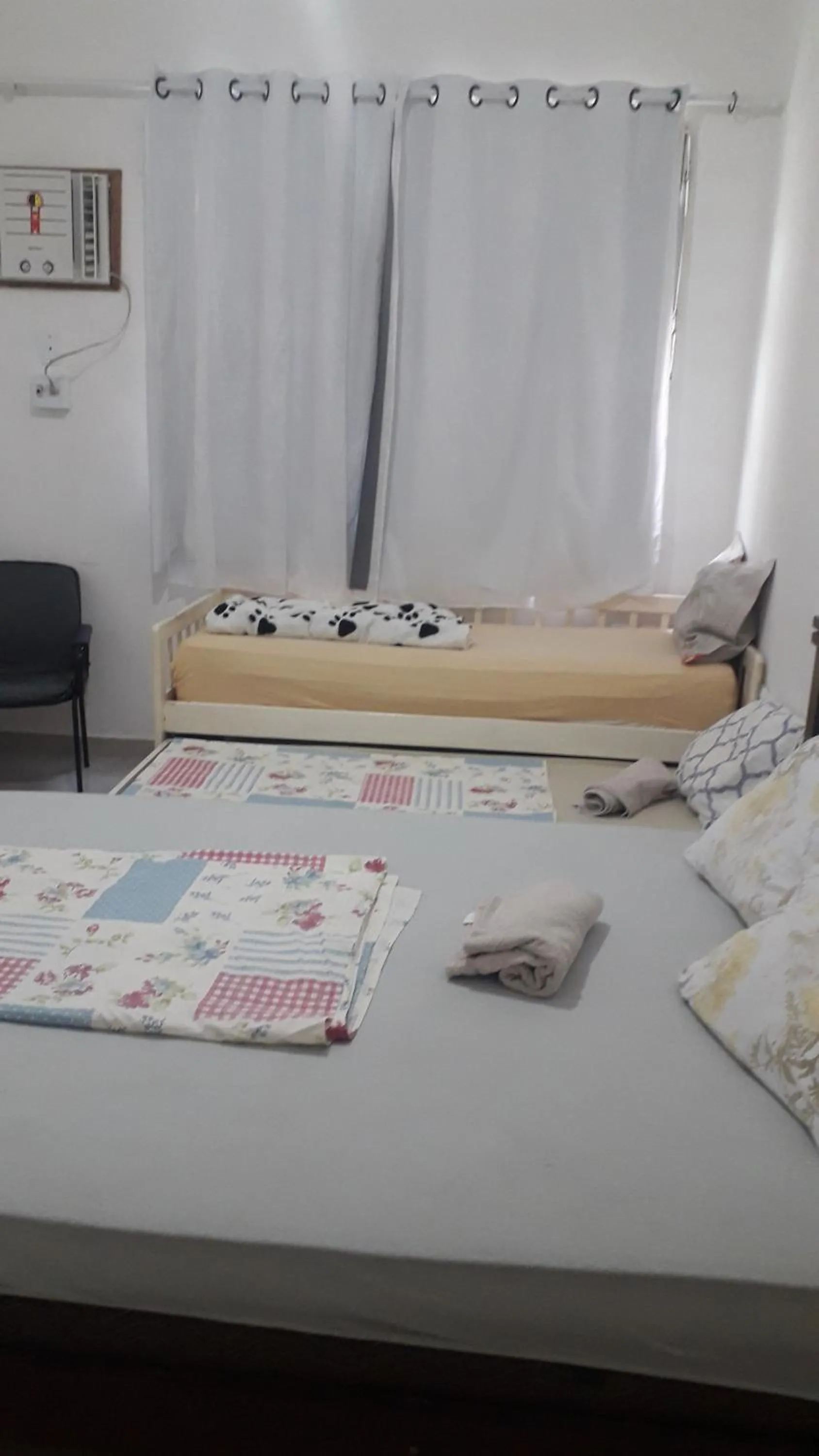 Bed in Pousada Cantinho da Família