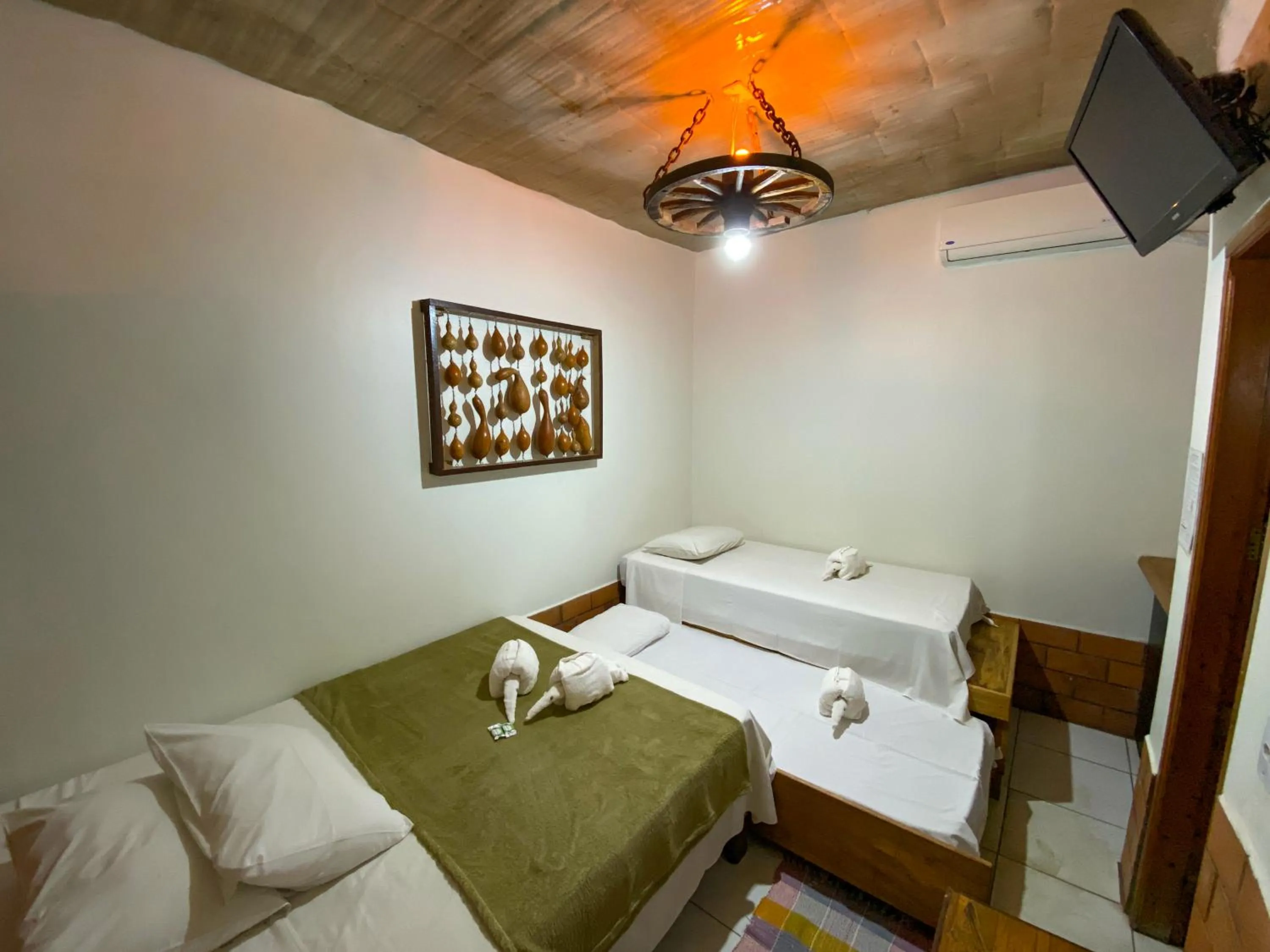 Bed in Pousada Segredo