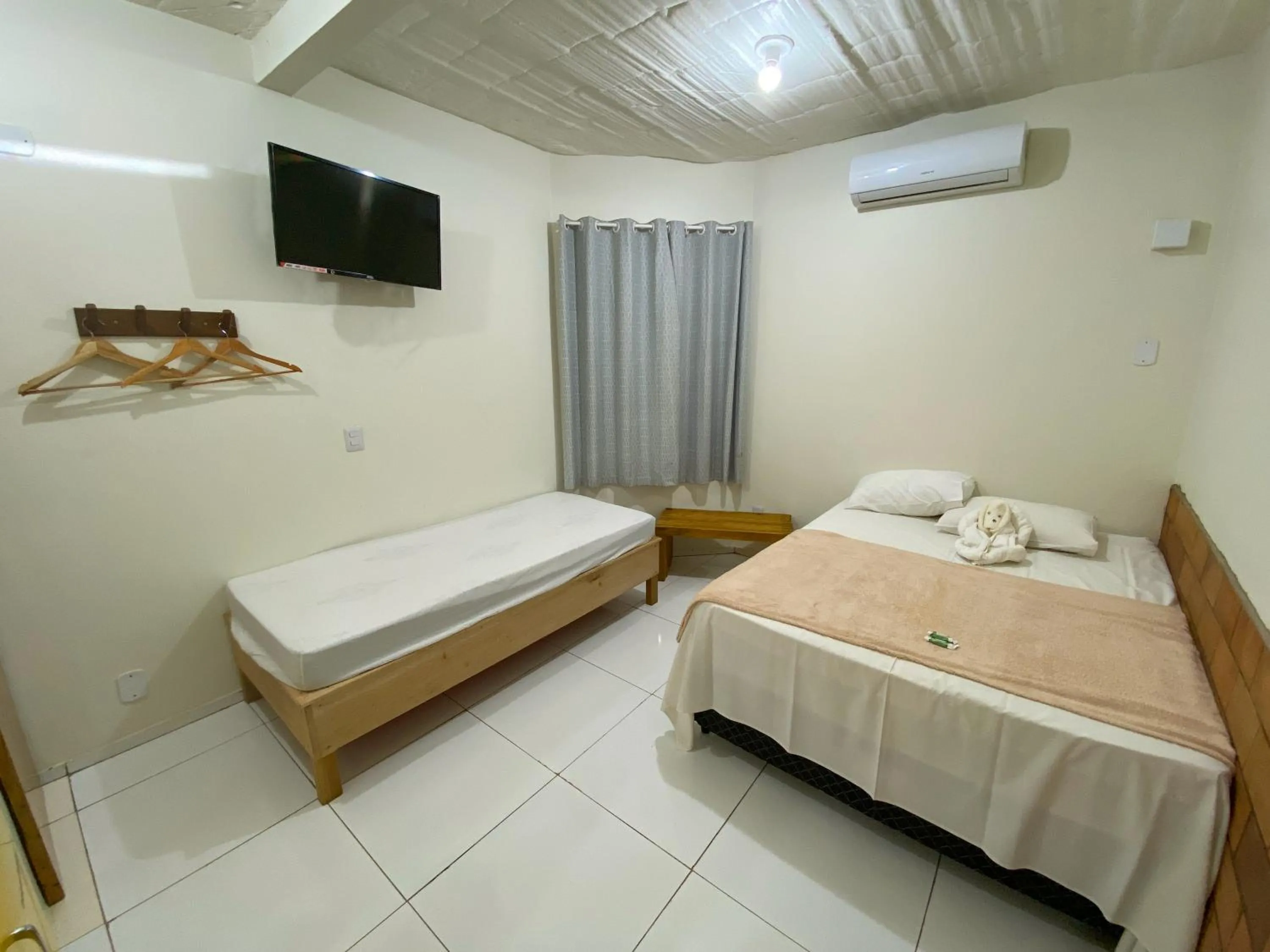 Bed in Pousada Segredo