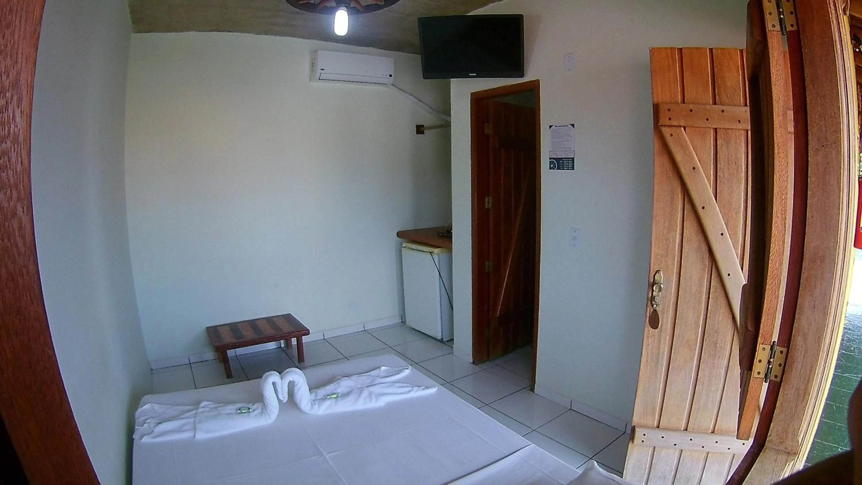 Bed in Pousada Segredo