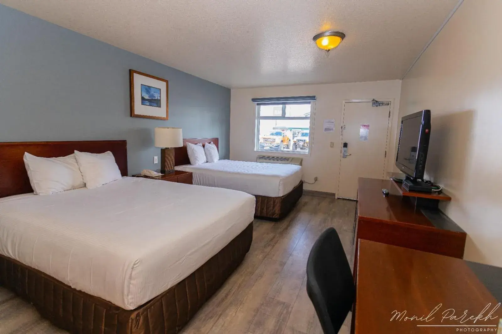 Bed in Empire Inn & Suites Bed in Empire Inn & Suites