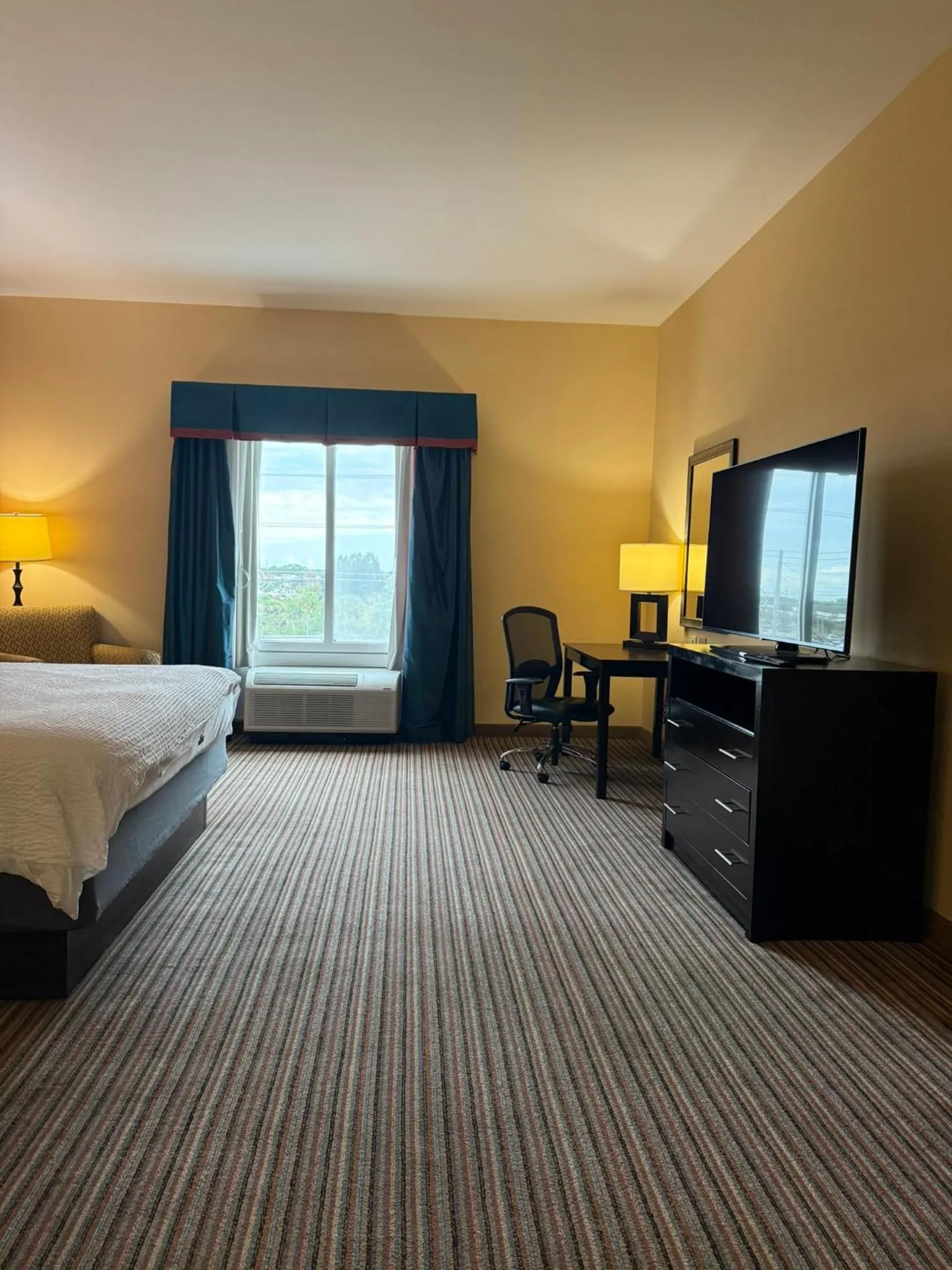 Photo of the whole room, Bed in Holiday Inn Titusville/Kennedy Space Center by IHG