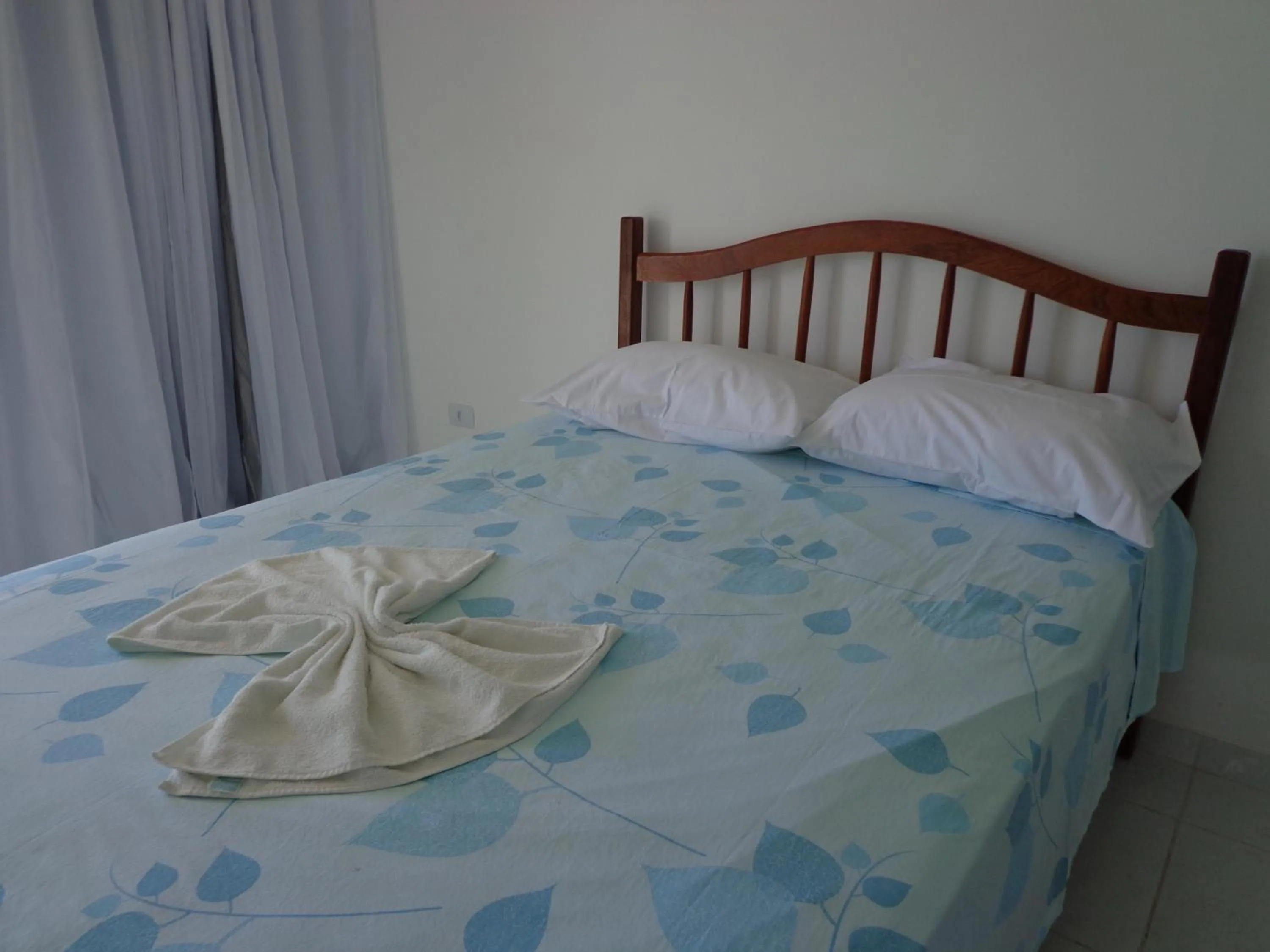 Bed in Porto Palace Pousada