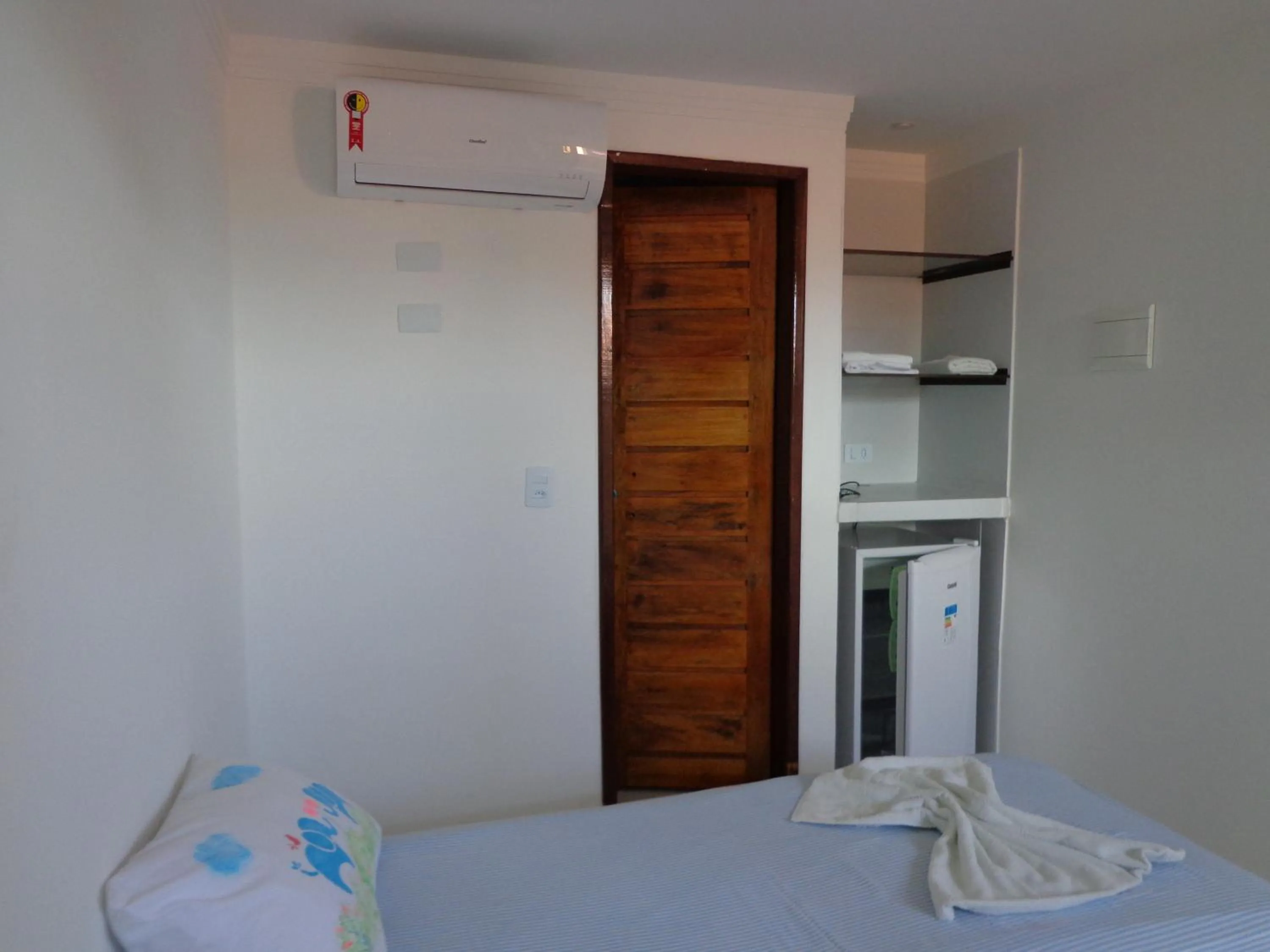 Bed in Porto Palace Pousada