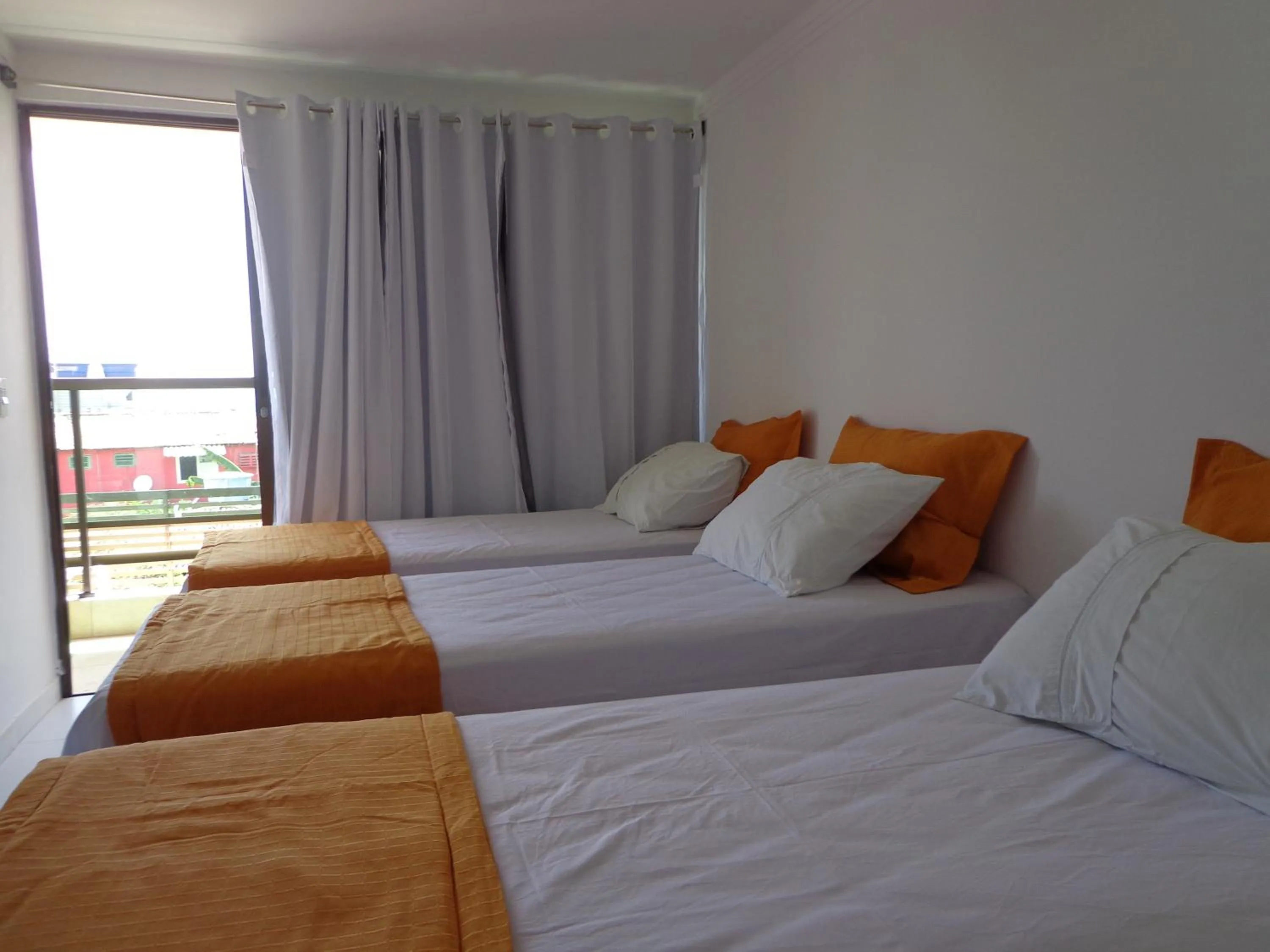 Bed in Porto Palace Pousada