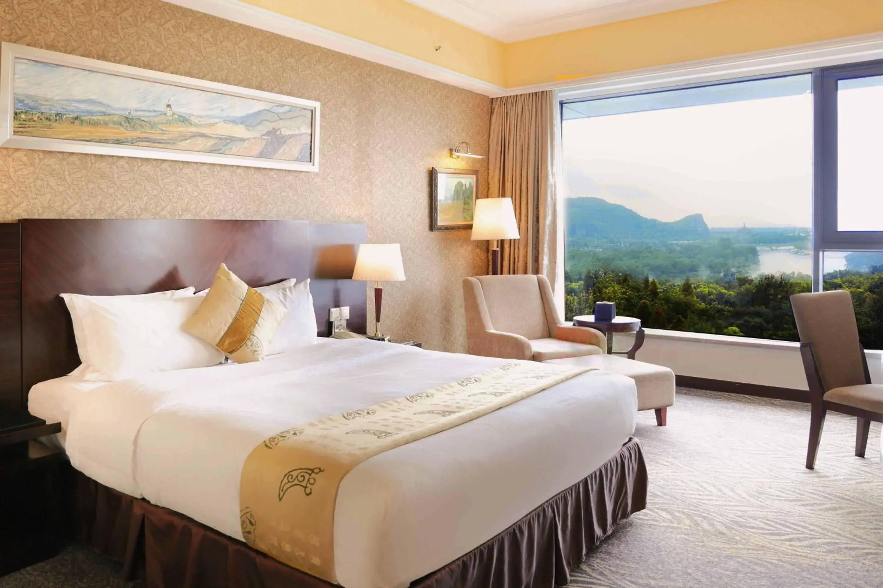 Photo of the whole room, Bed in Lijiang Waterfall Hotel Guilin Photo of the whole room, Bed in Lijiang Waterfall Hotel Guilin