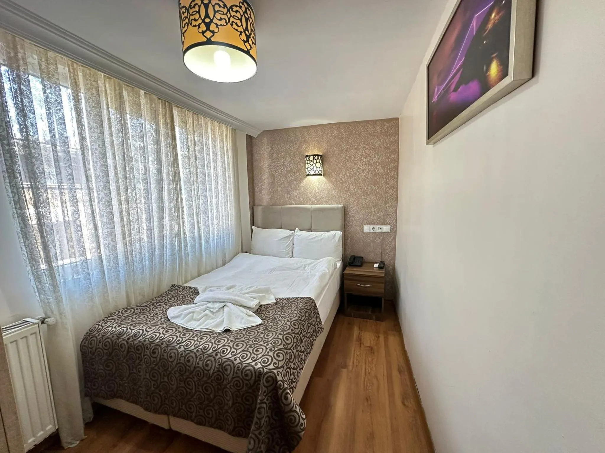 Bed in Hotel Buhara Family Inn