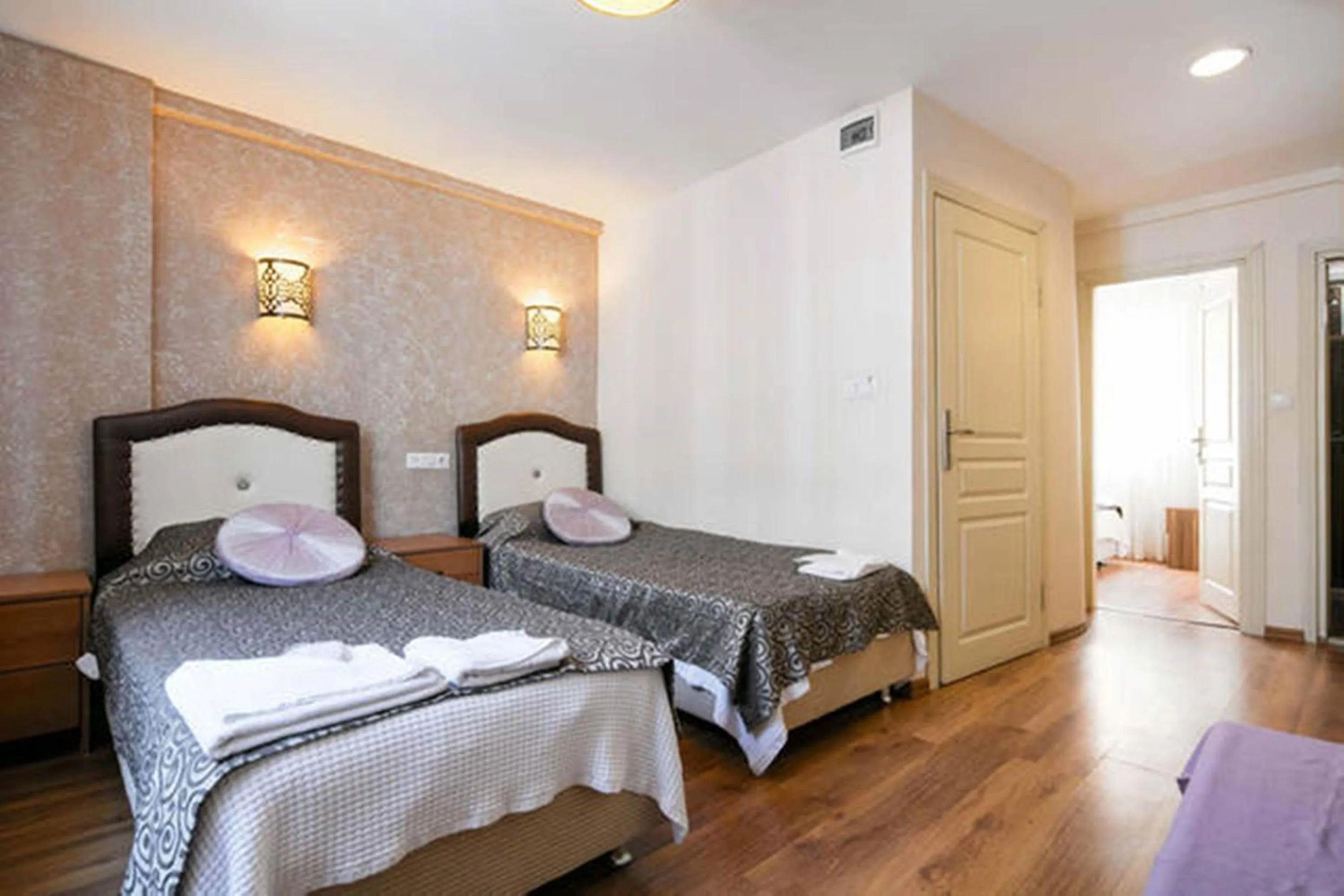 Photo of the whole room, Bed in Hotel Buhara Family Inn