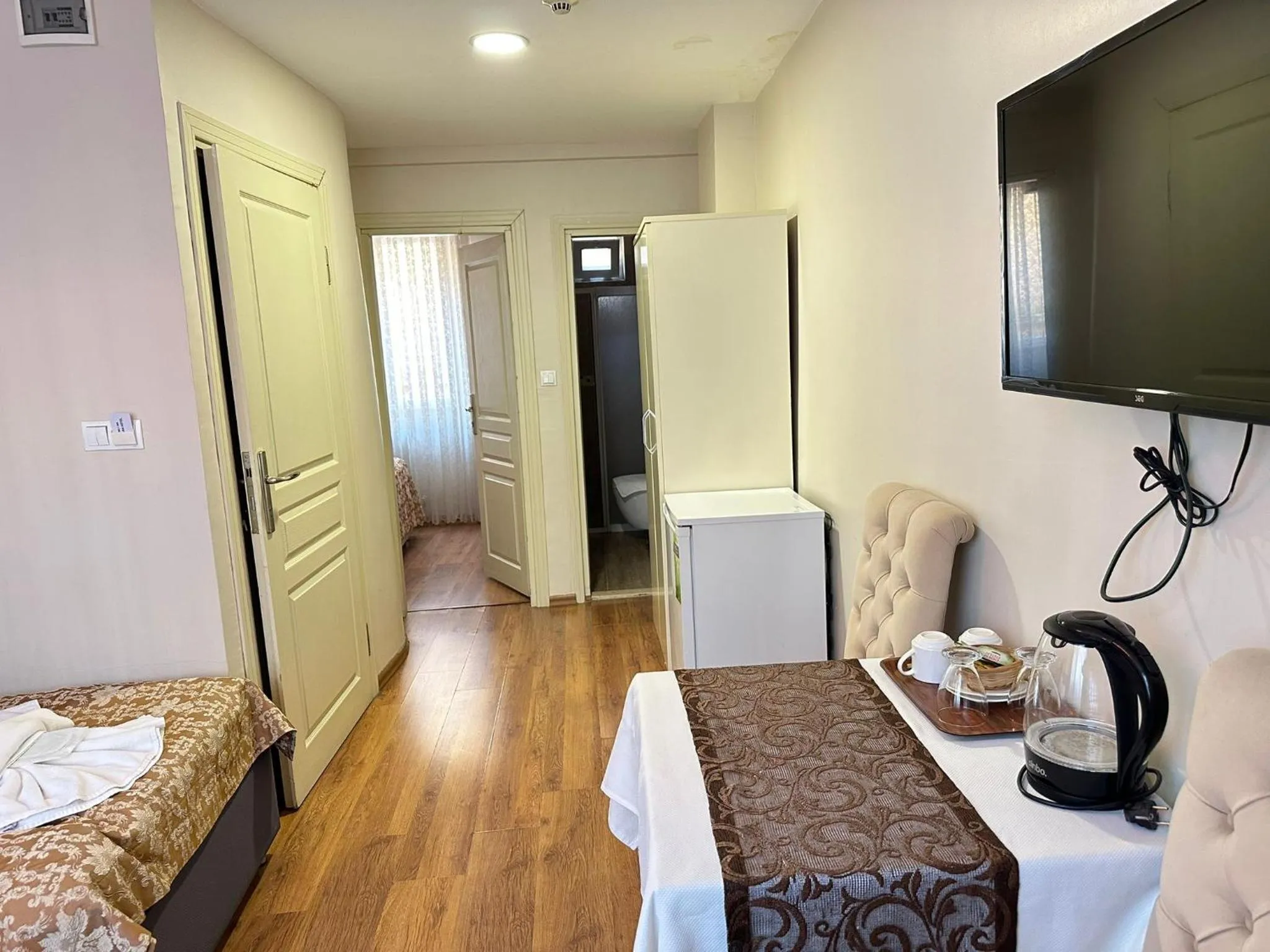 Photo of the whole room, Bed in Hotel Buhara Family Inn