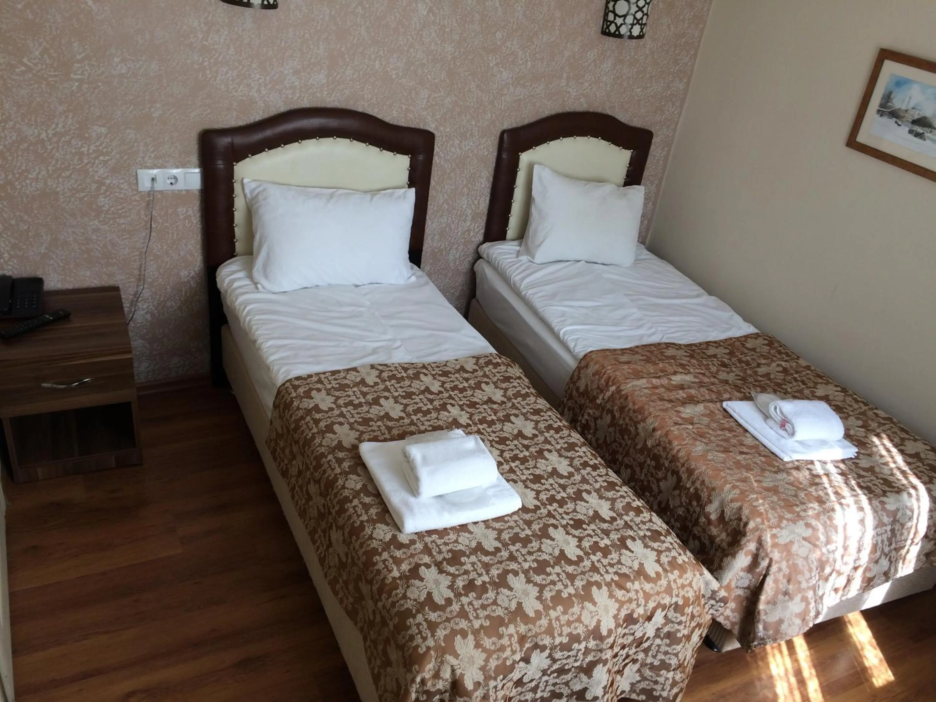 Bed in Hotel Buhara Family Inn