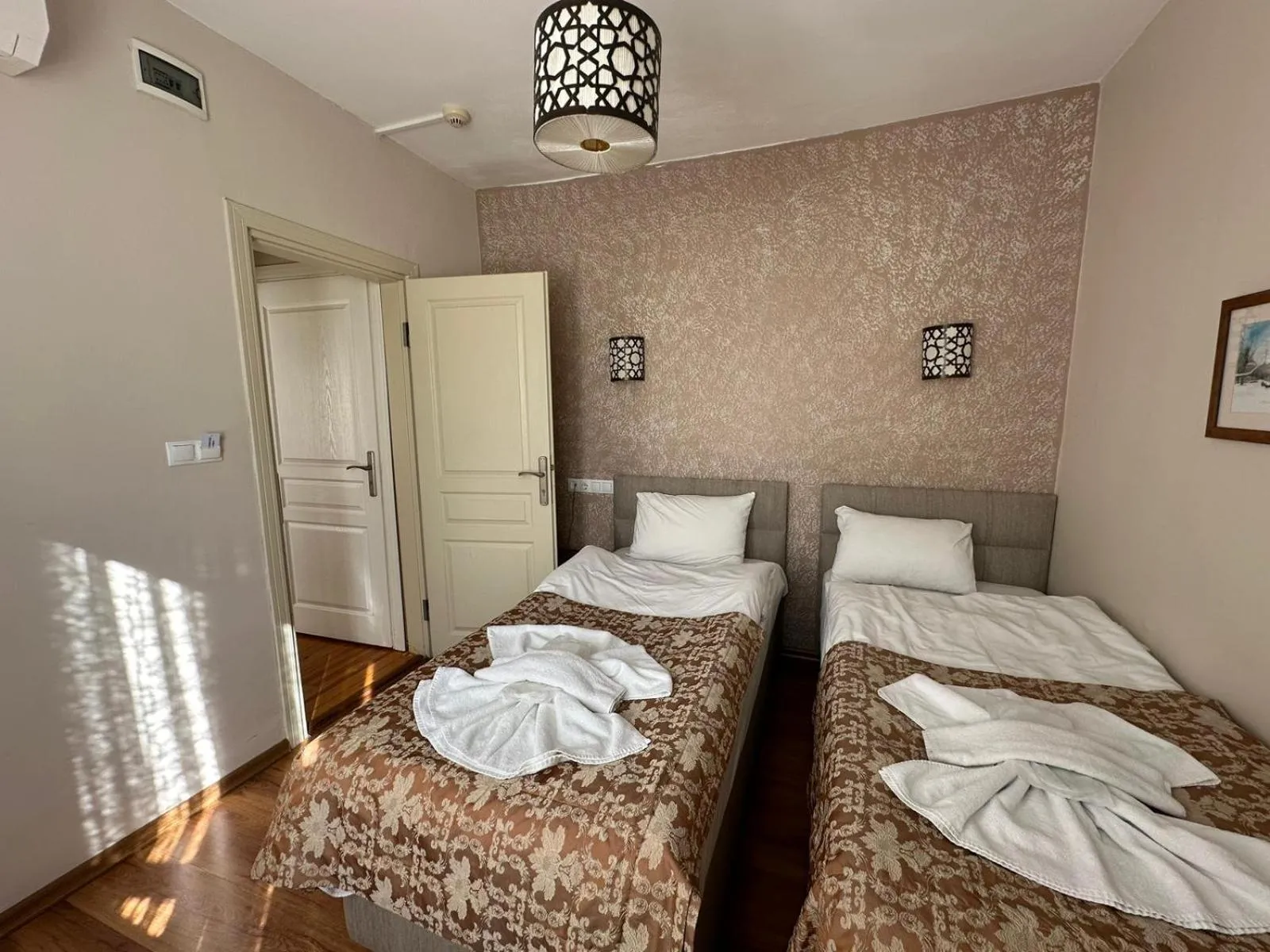 Bed in Hotel Buhara Family Inn