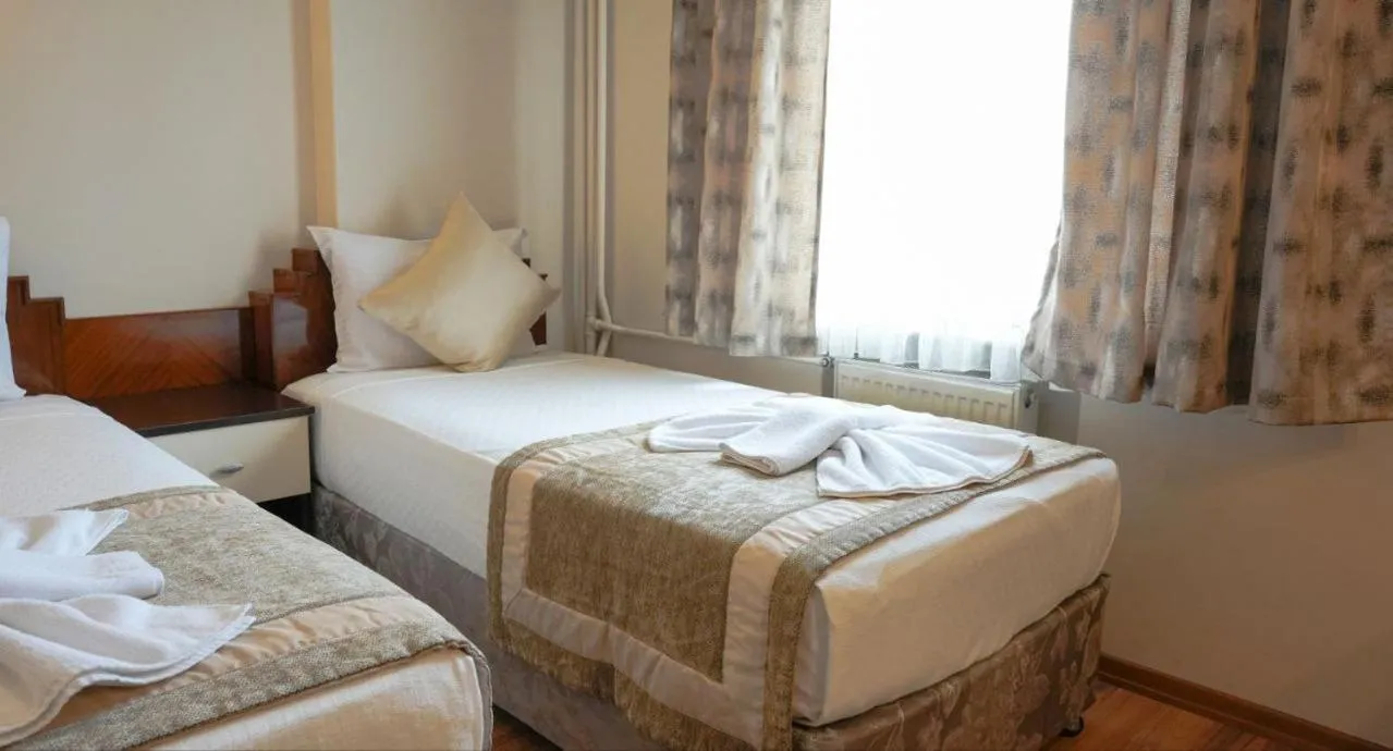 Bed in Hotel Akyildiz