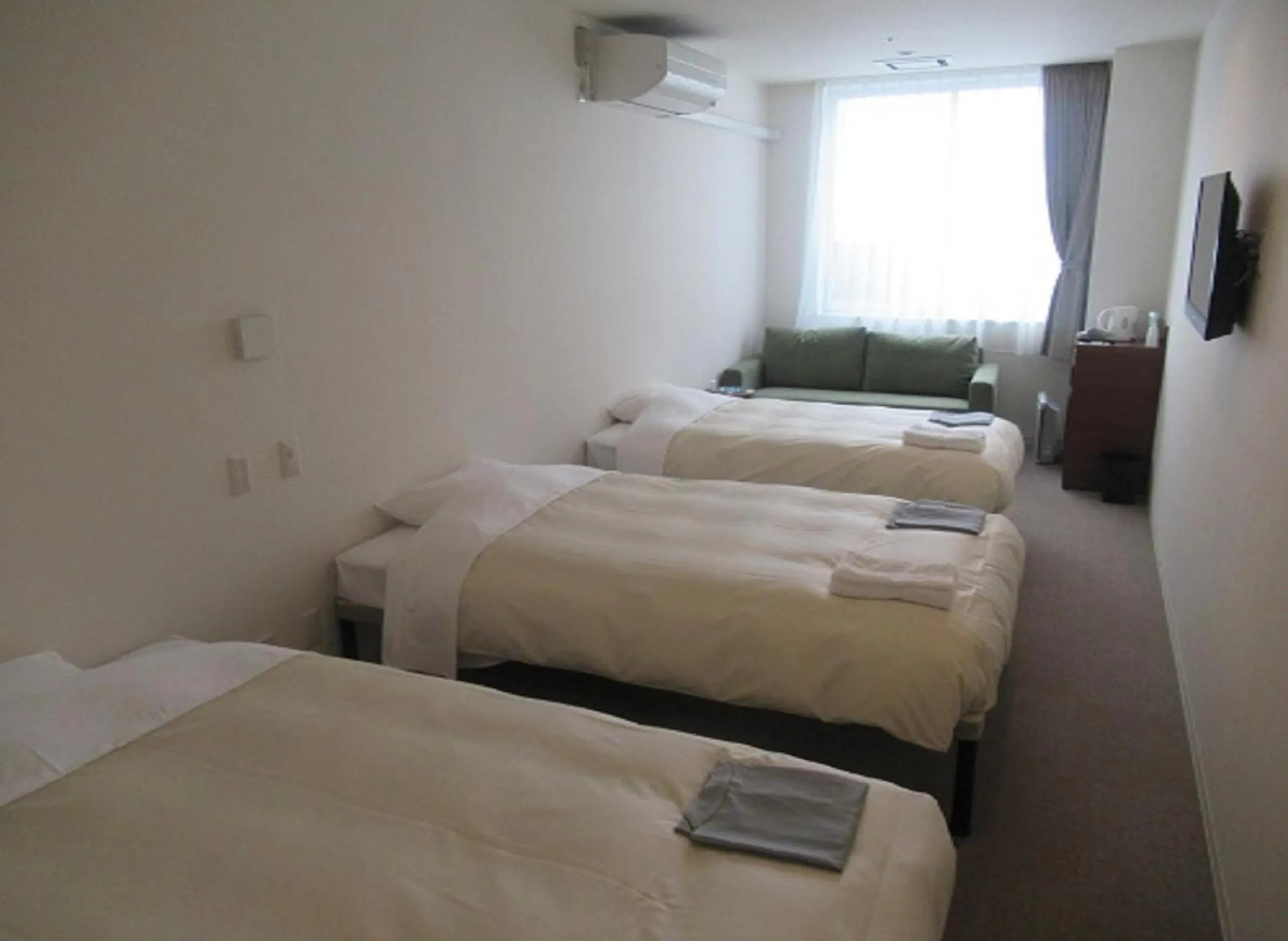 Photo of the whole room, Bed in Hotel Crown Hills Kushiro