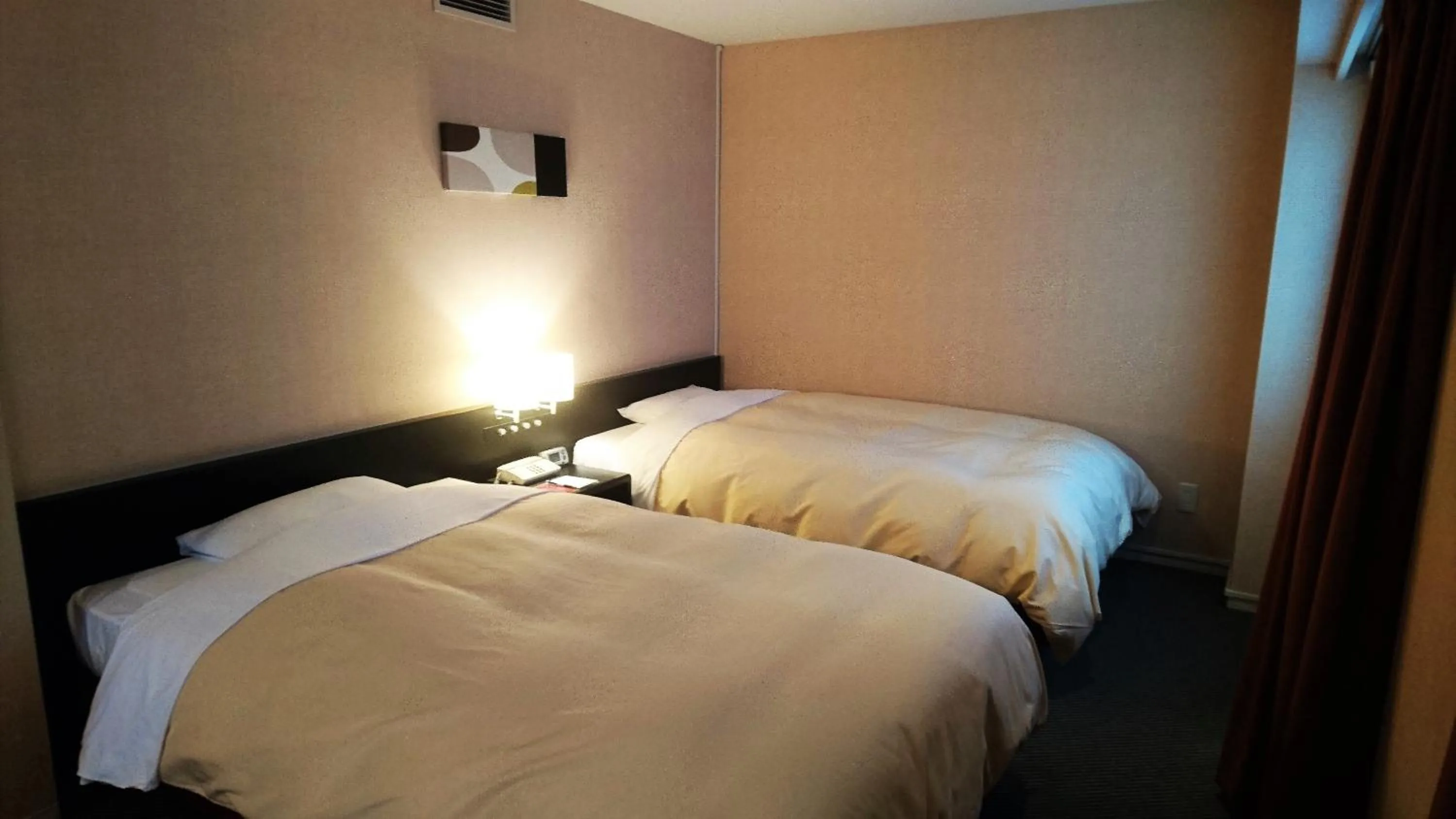 Bed in Hotel Crown Hills Kushiro