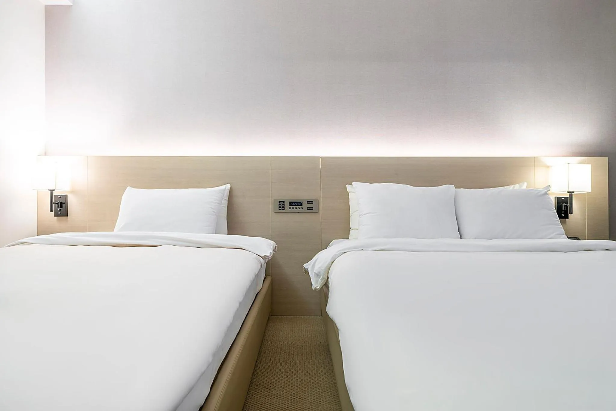 Bed in Wonju Citi Hotel