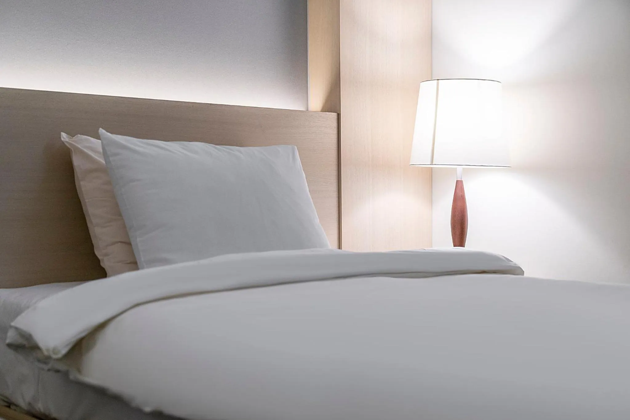 Bed in Wonju Citi Hotel