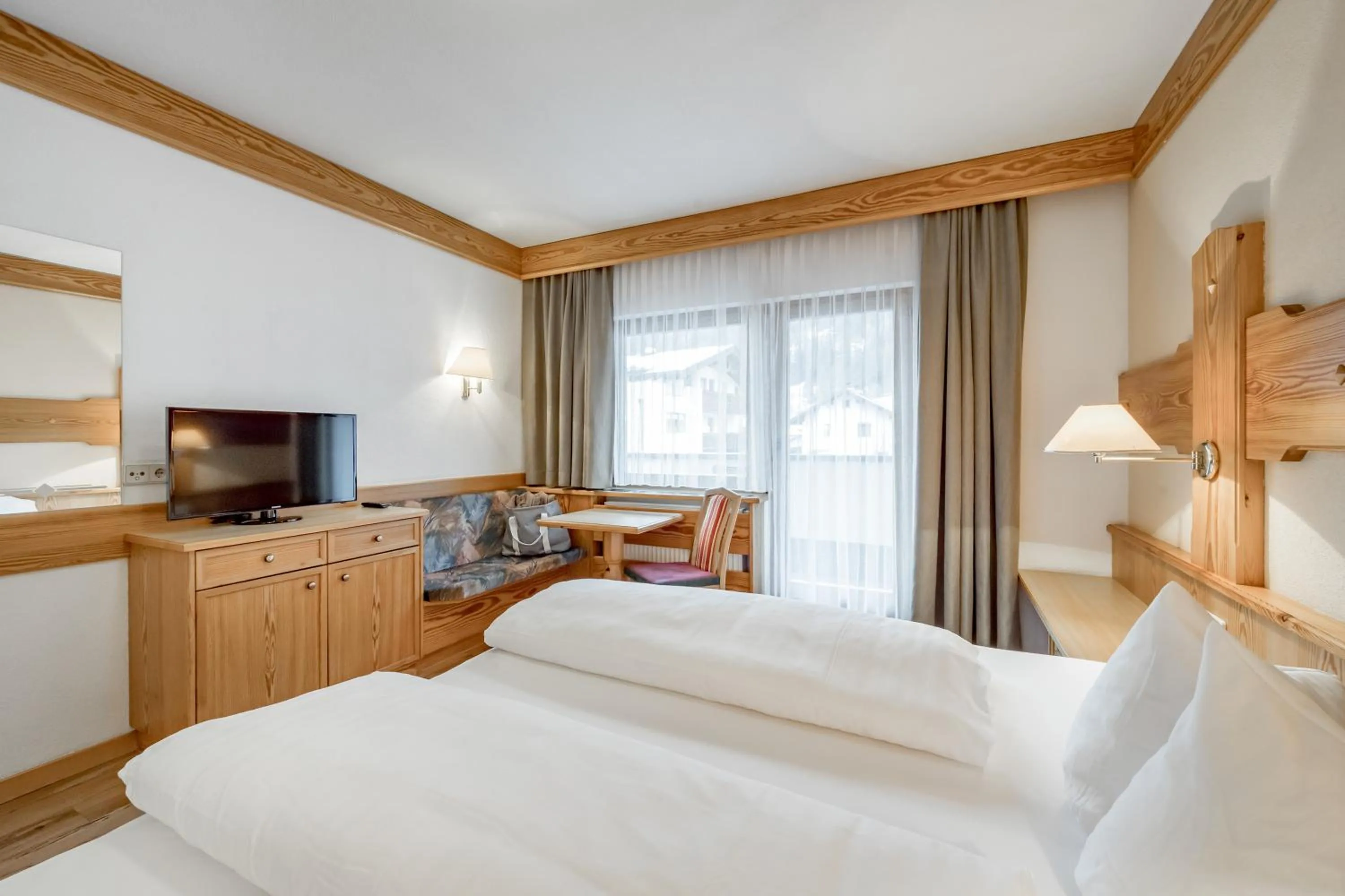 Photo of the whole room, Bed in tilia living - b&b mit dem Komfort eines kleinen, feinen Hotels