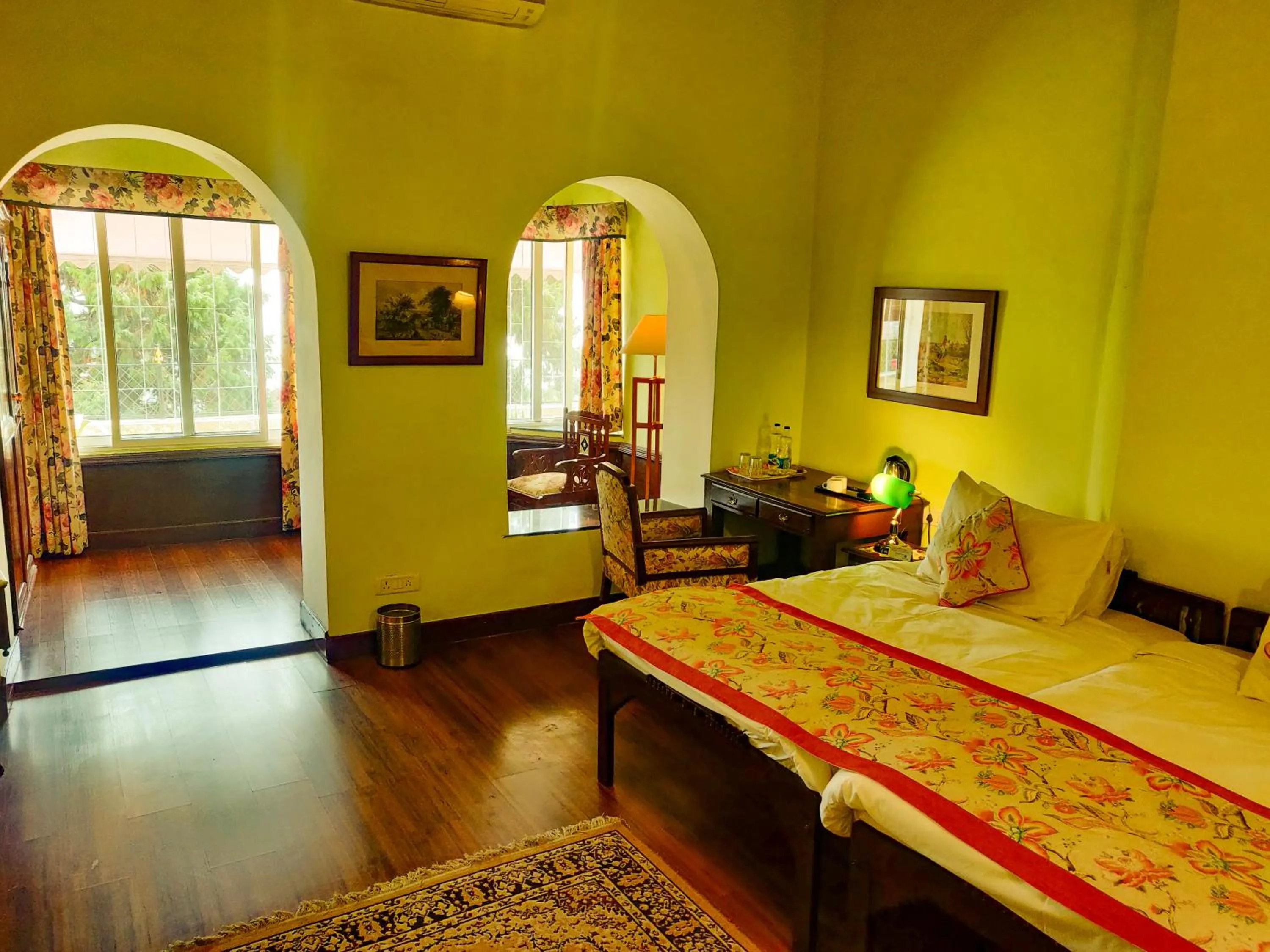 Bed in WelcomHeritage Kasmanda Palace