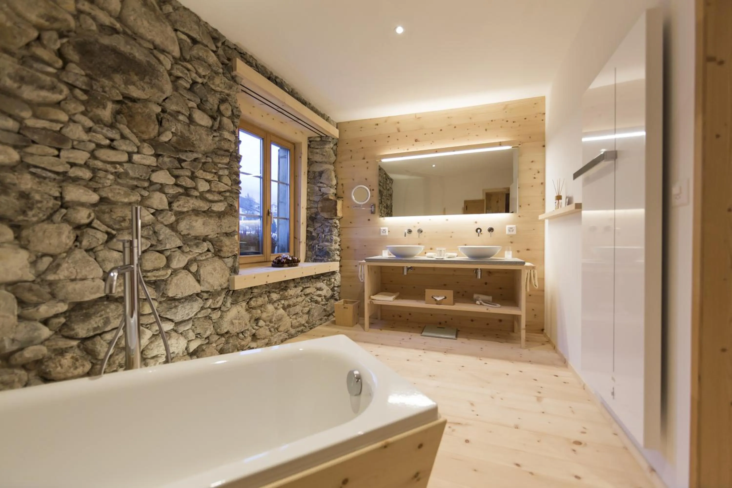 Bathroom in Relais & Châteaux IN LAIN Hotel Cadonau