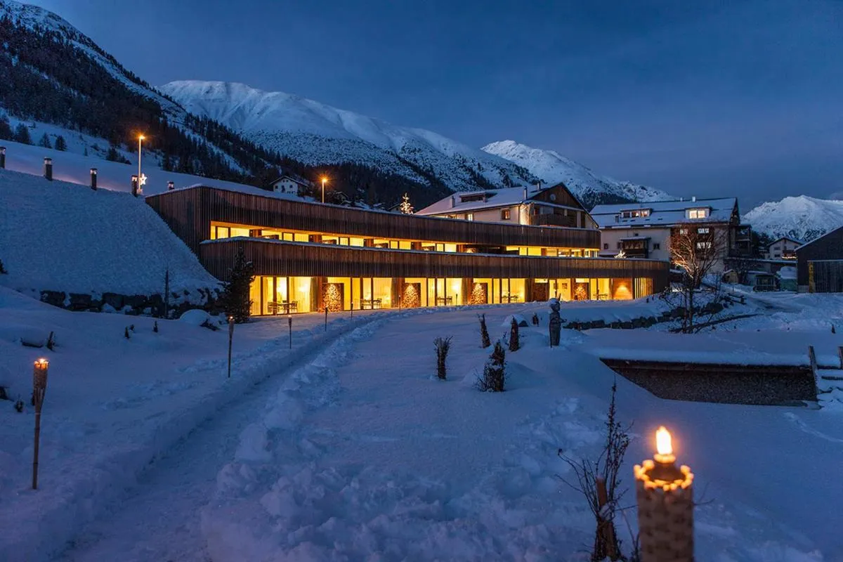 Property building in Relais & Châteaux IN LAIN Hotel Cadonau