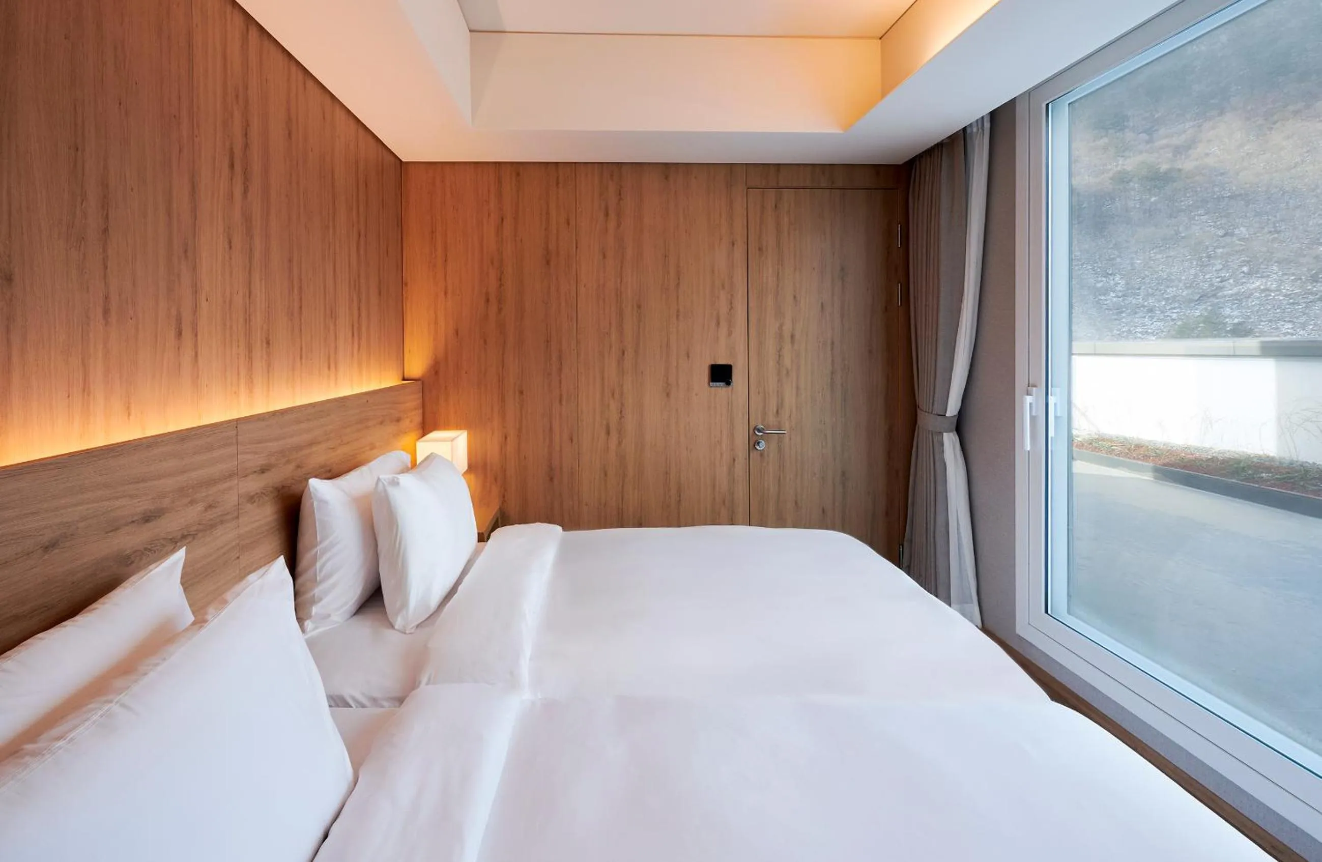 Bed in PARK ROCHE Resort & Wellness