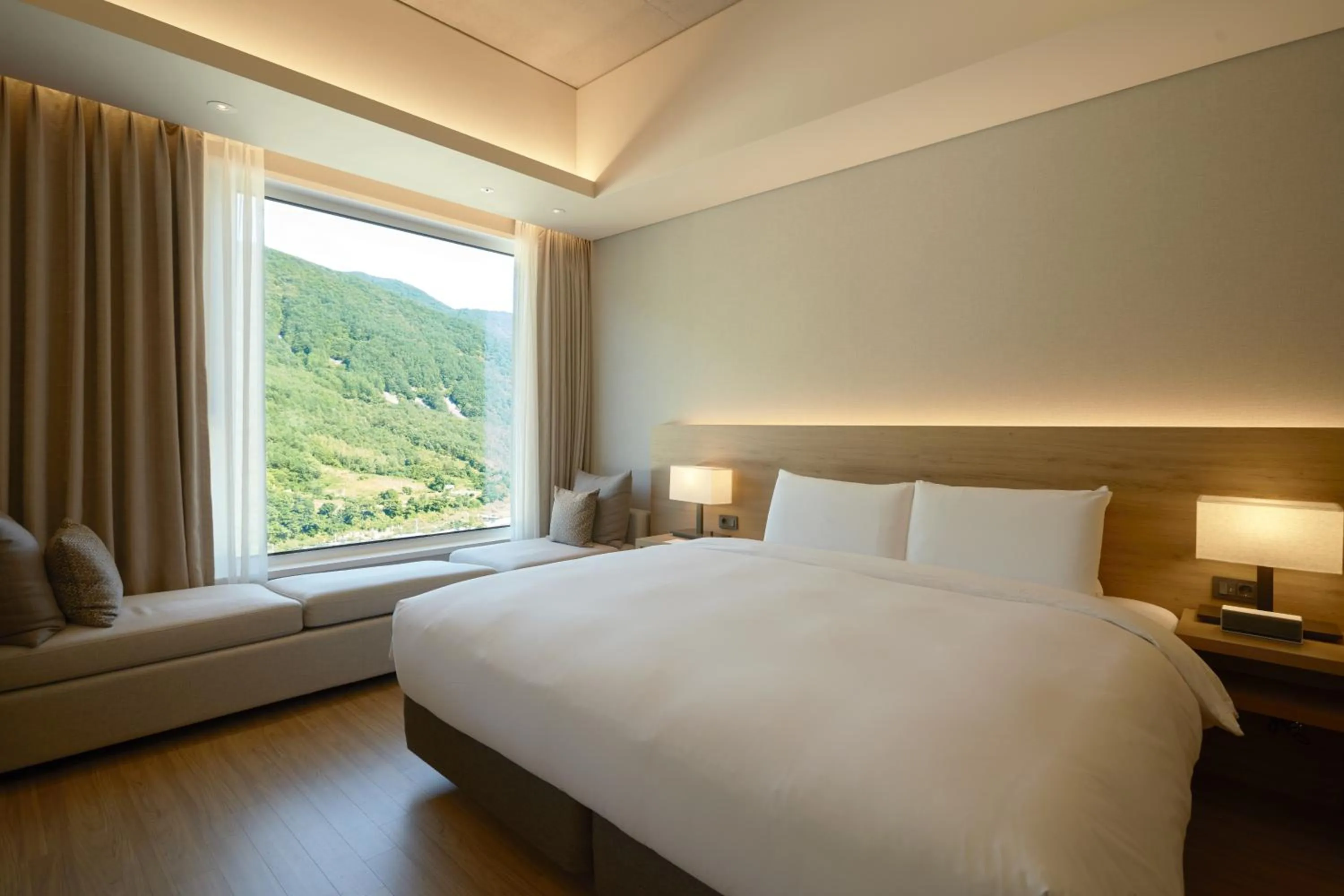 Bed in PARK ROCHE Resort & Wellness