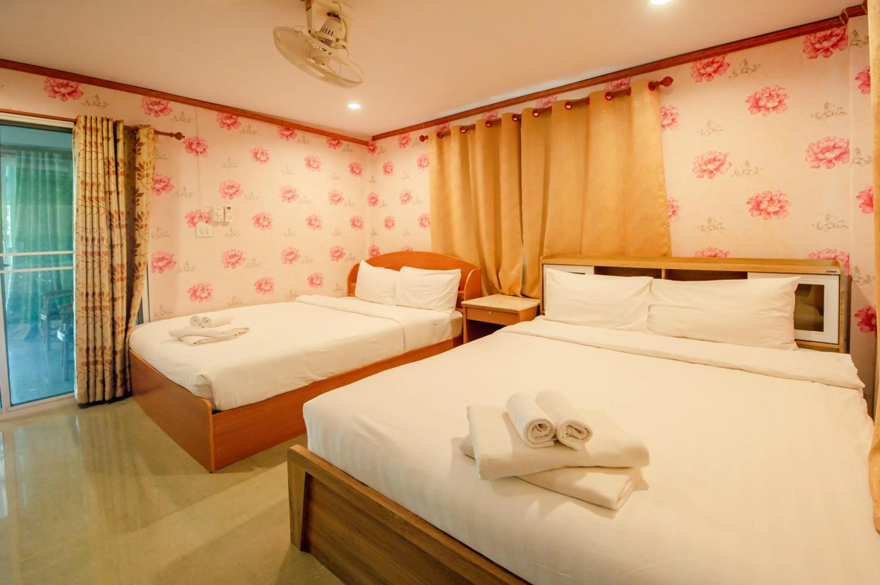 Bed in Golden Dragon Kanchanaburi