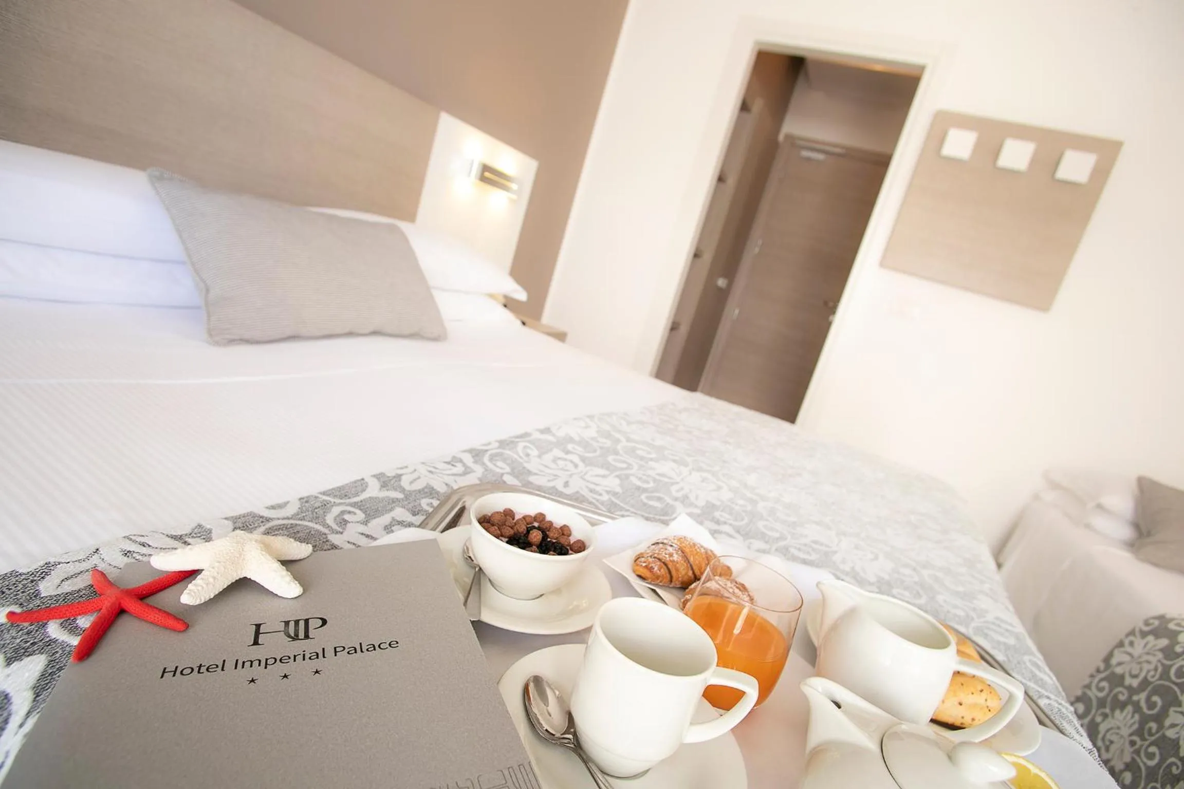 Bed in Hotel Imperial Palace