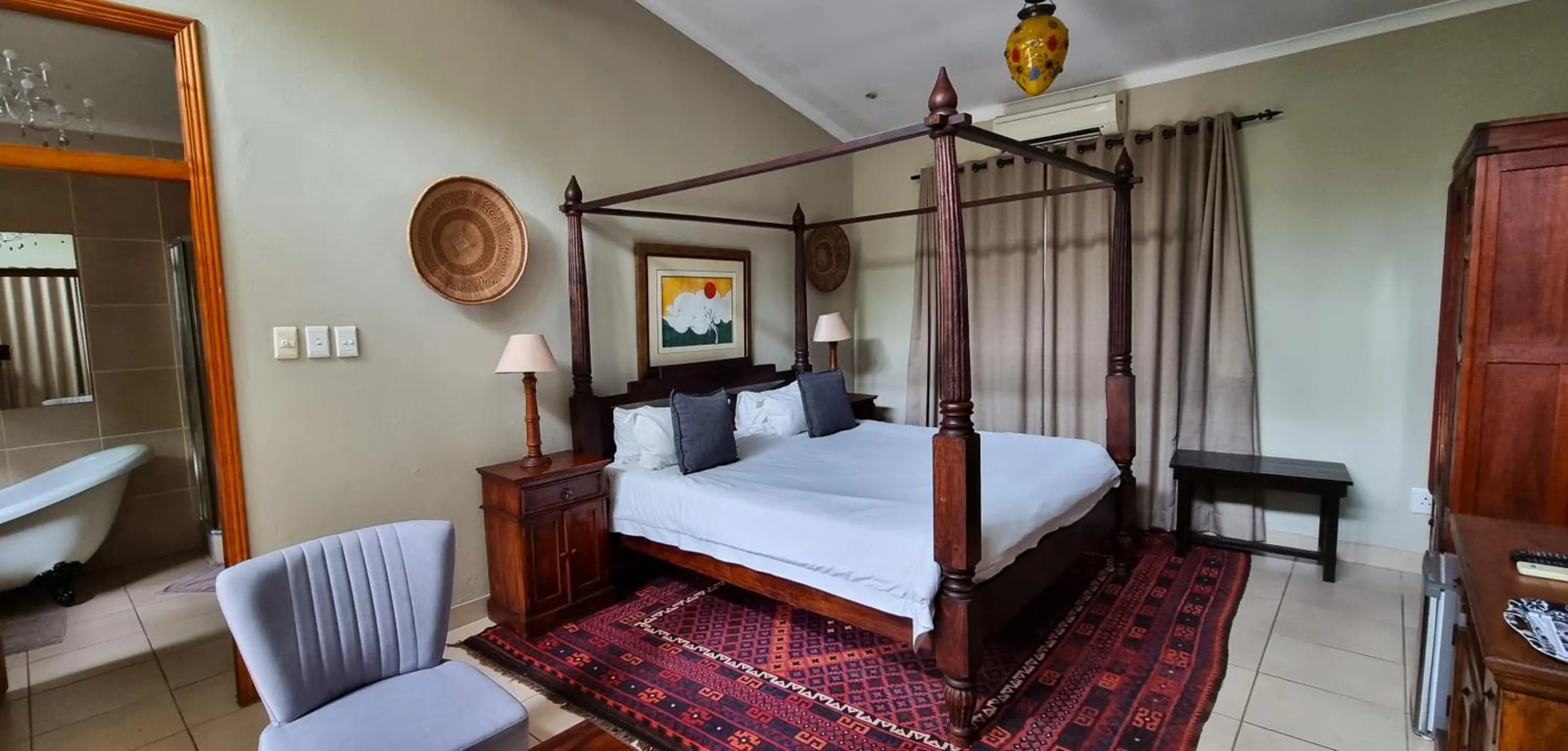 Bed in African Roots Guest House
