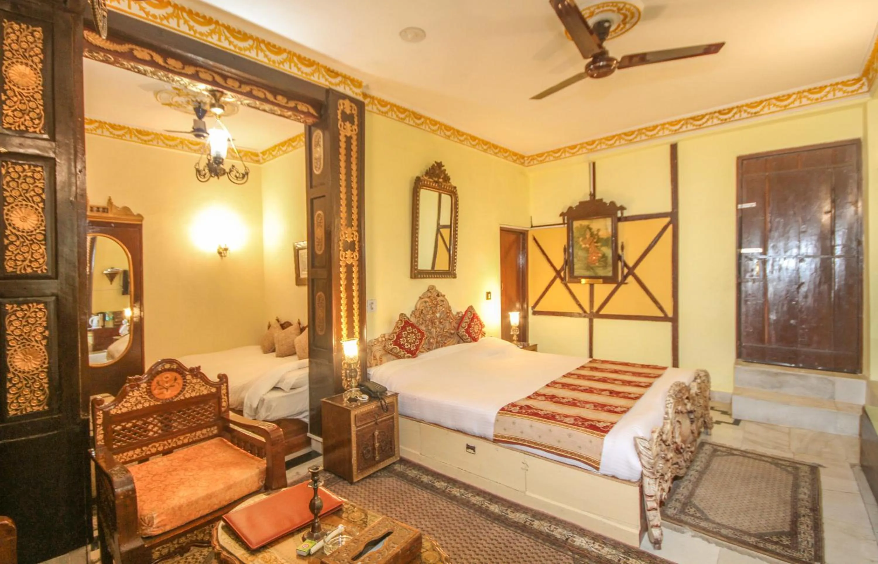 Bed in WelcomHeritage Grace Hotel