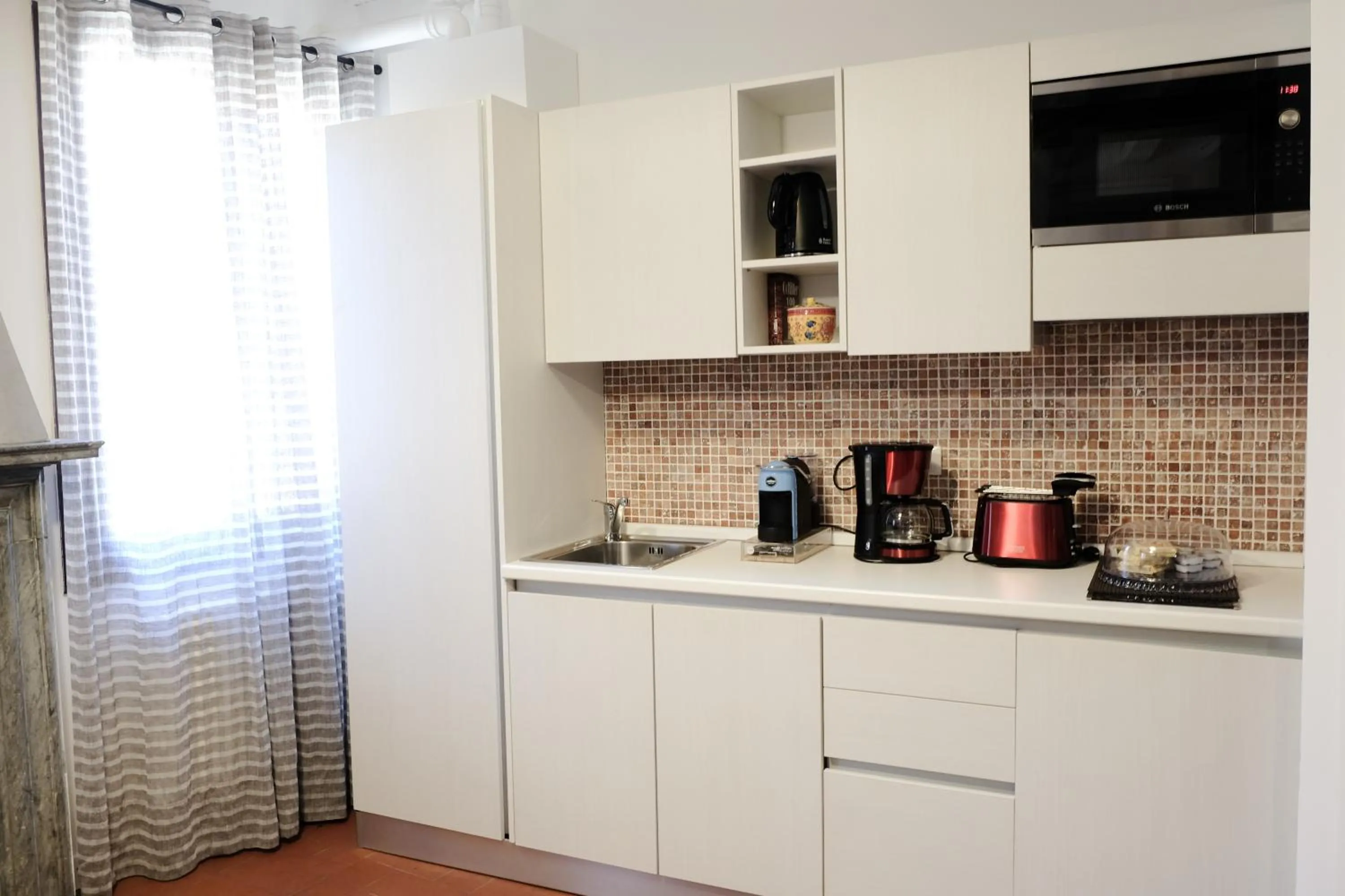 Kitchen or kitchenette in Residenza Vescovado