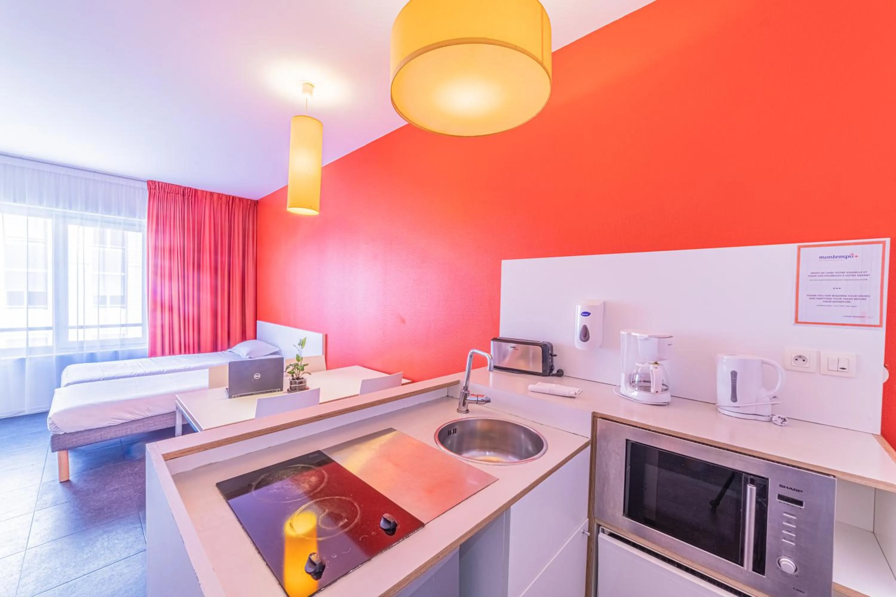 Kitchen or kitchenette in Residence Montempo Appart'Hôtel Lyon Cite Internationale