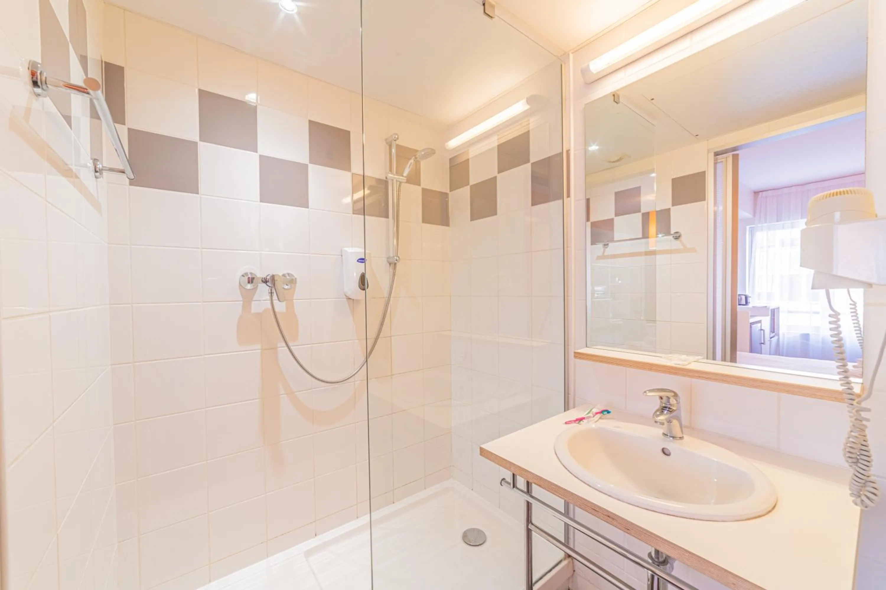 Bathroom in Residence Montempo Appart'Hôtel Lyon Cite Internationale